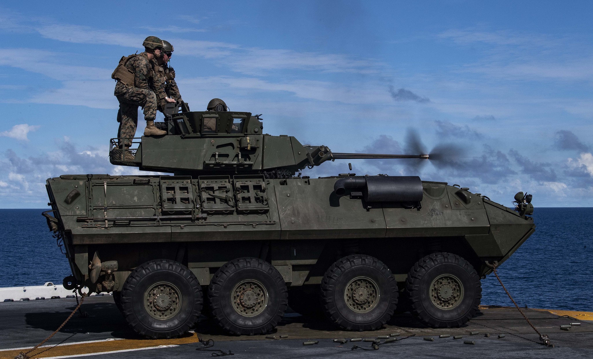 Marines fire a Light Armored Vehicle (LAV) M242 Bushmaster 25mm chain gun during a drill aboard the amphibious assault ship USS Wasp (LHD 1) Aug. 7, 2019, in the Pacific Ocean. (Mass Communication Specialist 1st Class Jeremy Starr/Navy)