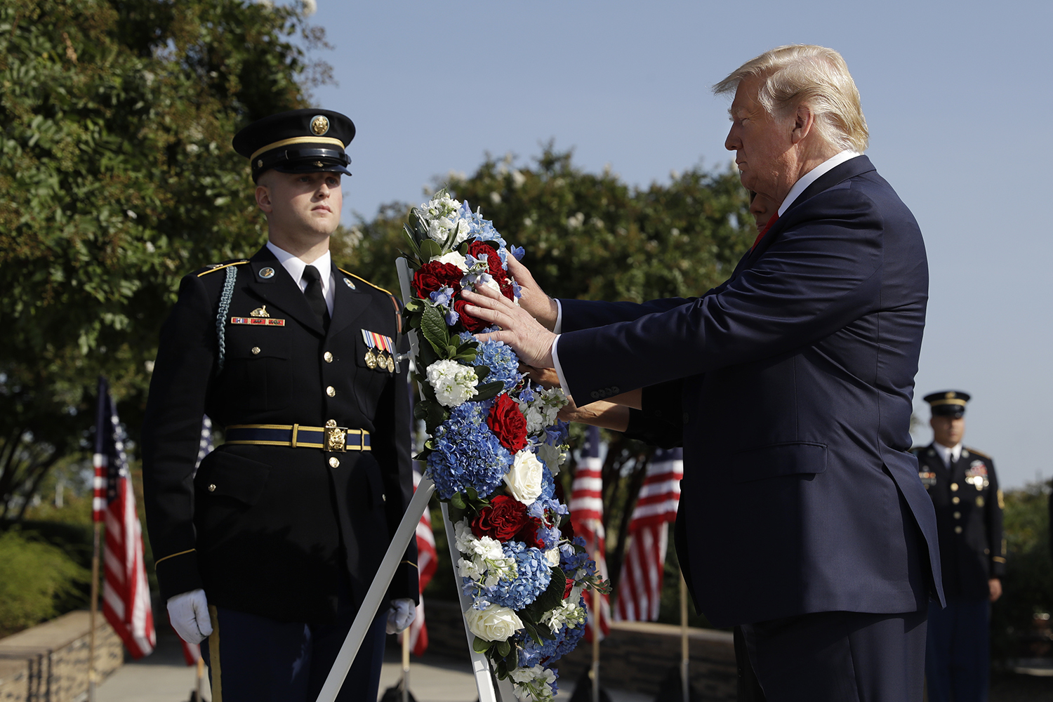 President Donald Trump and first lady Melania Trump place a wreath and will participate in a moment of silence honoring the victims of the Sept. 11 terrorist attacks, Wednesday, Sept. 11, 2019, at the Pentagon. (Evan Vucci/AP)