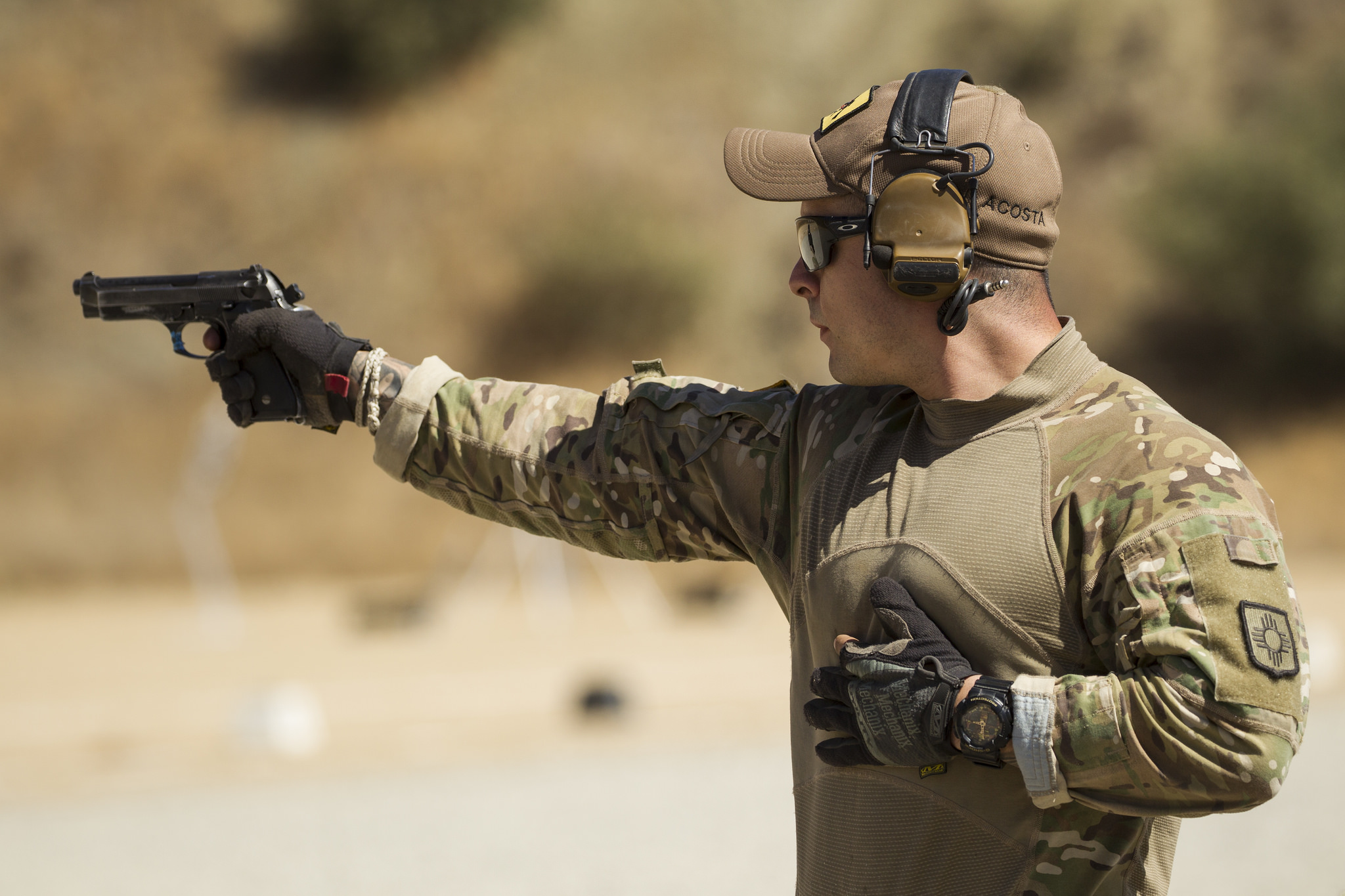 Army Sgt. Francisco Acosta of Headquarters and Headquarters Company, 1st Battalion, 200th Infantry Regiment, New Mexico Army National Guard, competes in the Marksmanship Advisory Council Region VII National Excellence in Competition Pistol event from 50-yards at Camp San Luis Obispo, Calif., Sept. 18, 2018. (Senior Airman Crystal Housman/Air National Guard)