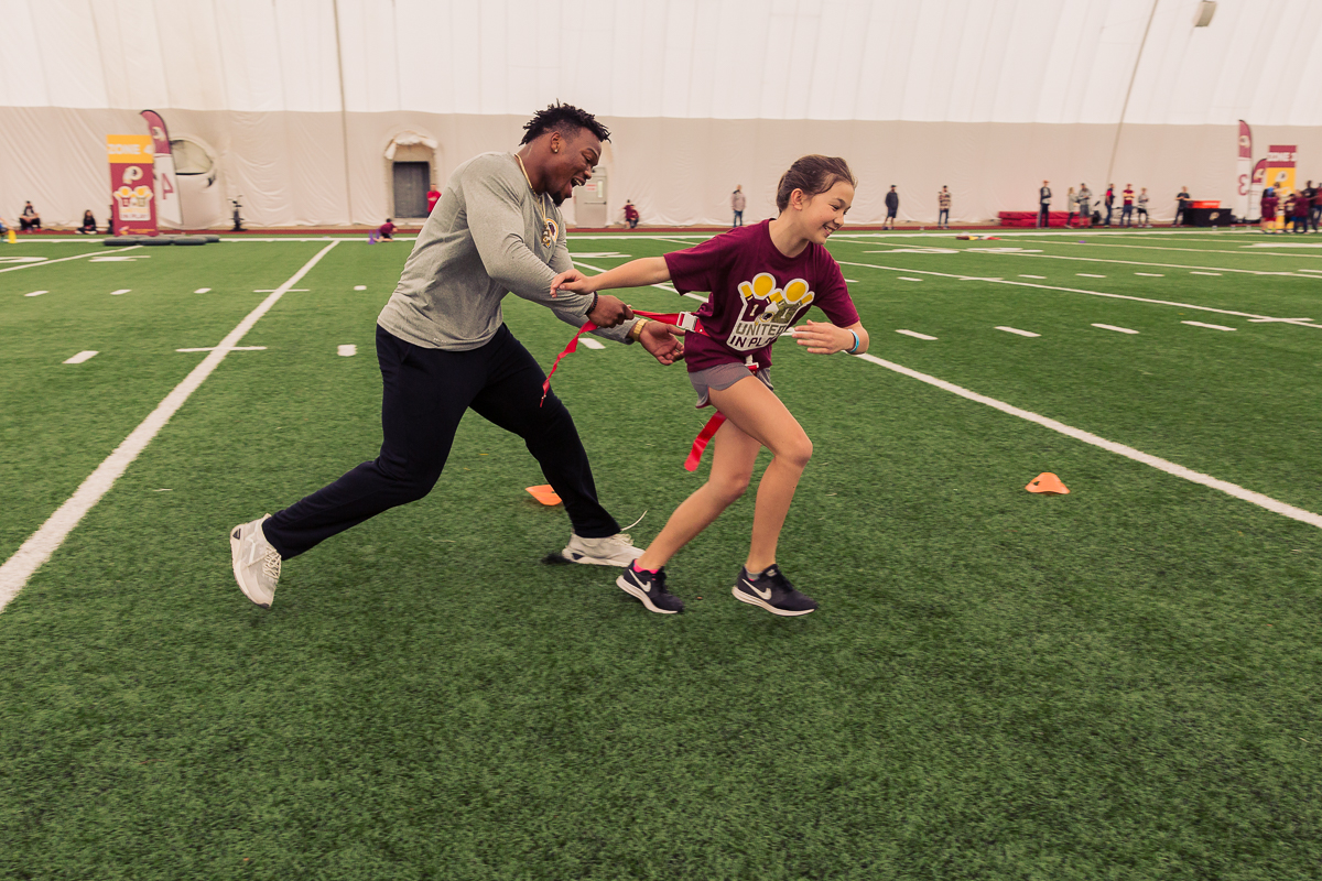 Military children participate in team-building activities for Army Forces Day on Saturday, June 19, 2018, at Redskins Park in Loudoun County, Va. (James Williams/Military Times)