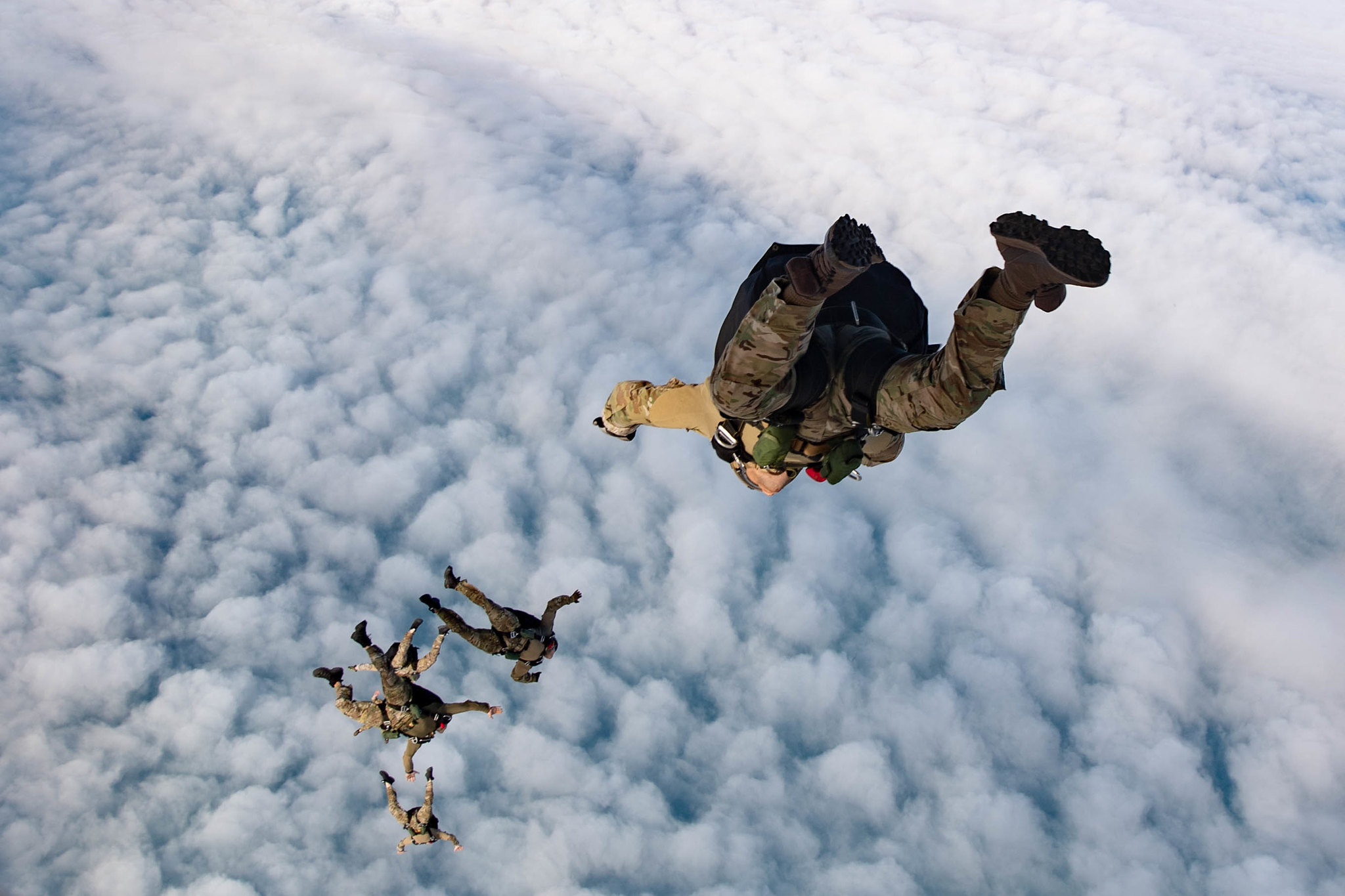 Explosive ordnance disposal technicians conduct unstable exit free fall jumps as part of flight operations with the Spanish navy on Feb. 13, 2020, in Rota, Spain. (Mass Communication Specialist 3rd Class Katie Cox/Navy)