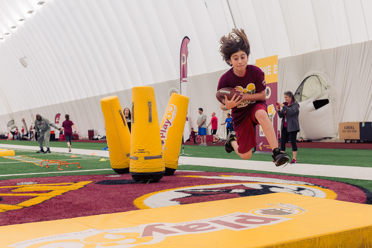Military children participate in team-building activities for Army Forces Day on Saturday, June 19, 2018, at Redskins Park in Loudoun County, Va. (James Williams/Military Times)