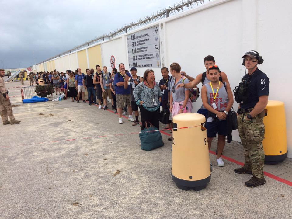 The New York National Guard's 106th Rescue Wing assists in airlifting U.S. citizens stranded in St. Martin on Sept. 9, 2017, after Hurricane Irma devastated the island, with HC-130 King aircrews, maintainers, rescue teams and other Airmen from New York, Puerto Rico and Kentucky to name a few. (Maj. Sean Boughal/National Guard)