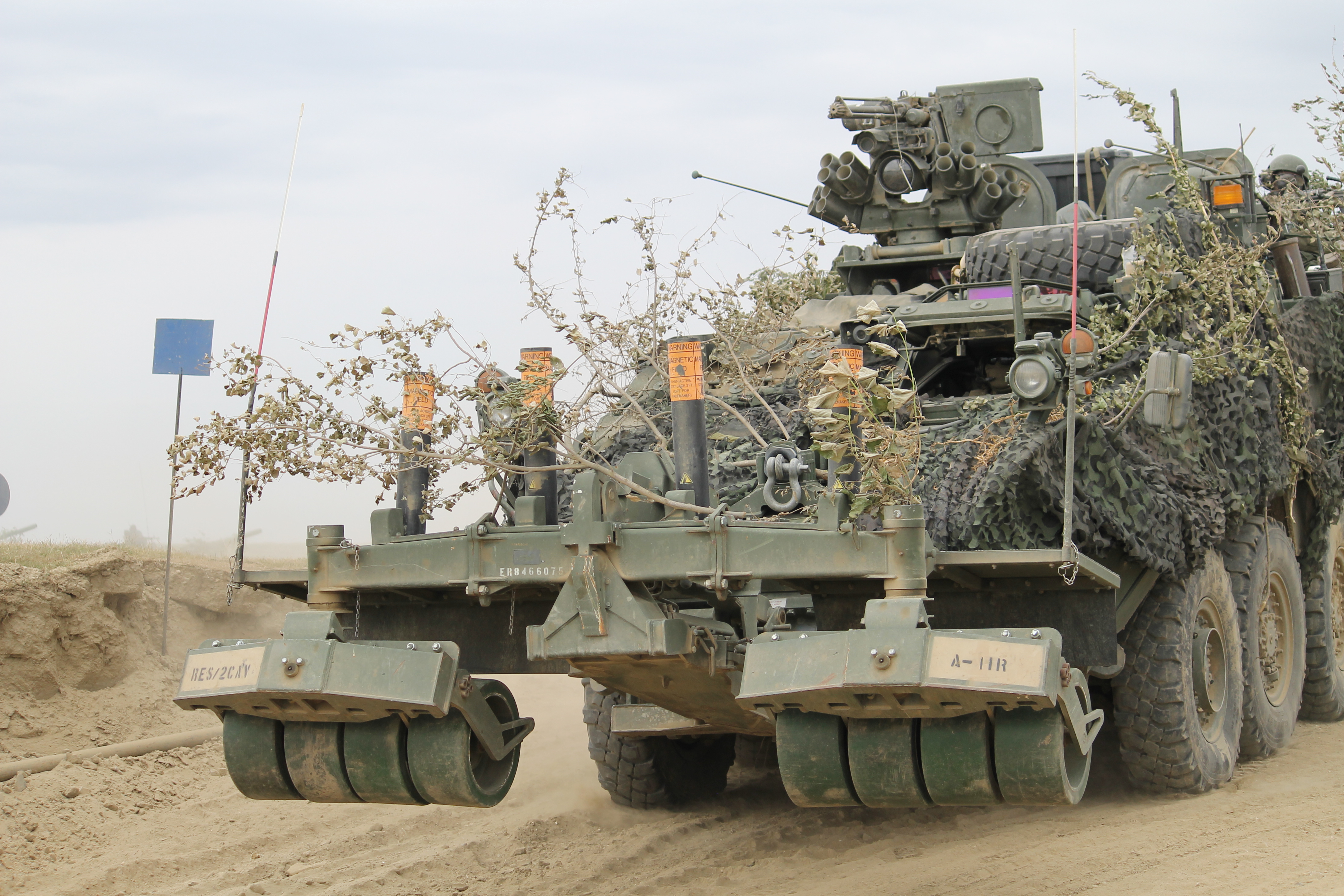 A U.S. Stryker outfitted with a counter-improvised explosive device capability prepares to cross the river. The Stryker crossing was the only U.S. participation in the exercise. (Jen Judson/Staff)