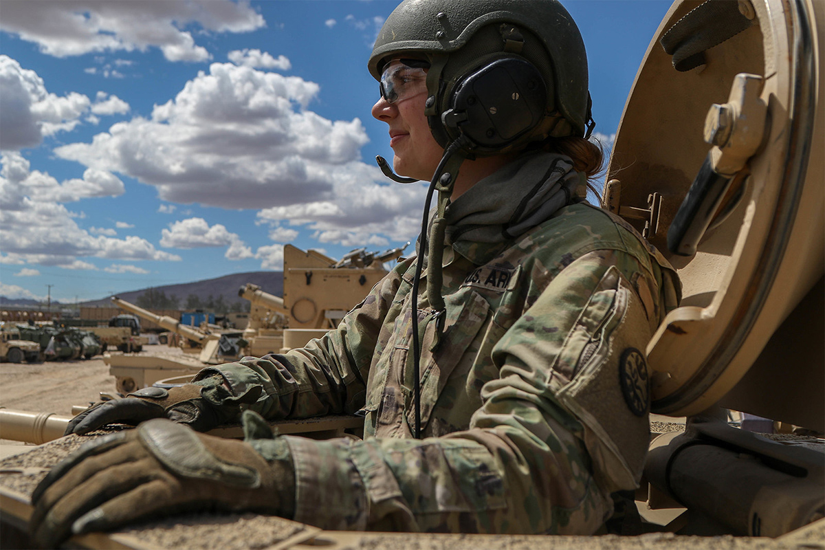 Army 2nd Lt. Caitlyn Simpson prepares her platoon for a training mission from inside a tank at Fort Irwin, Calif., May 28. 2019. (Cpl. Alisha Grezlik/Army)
