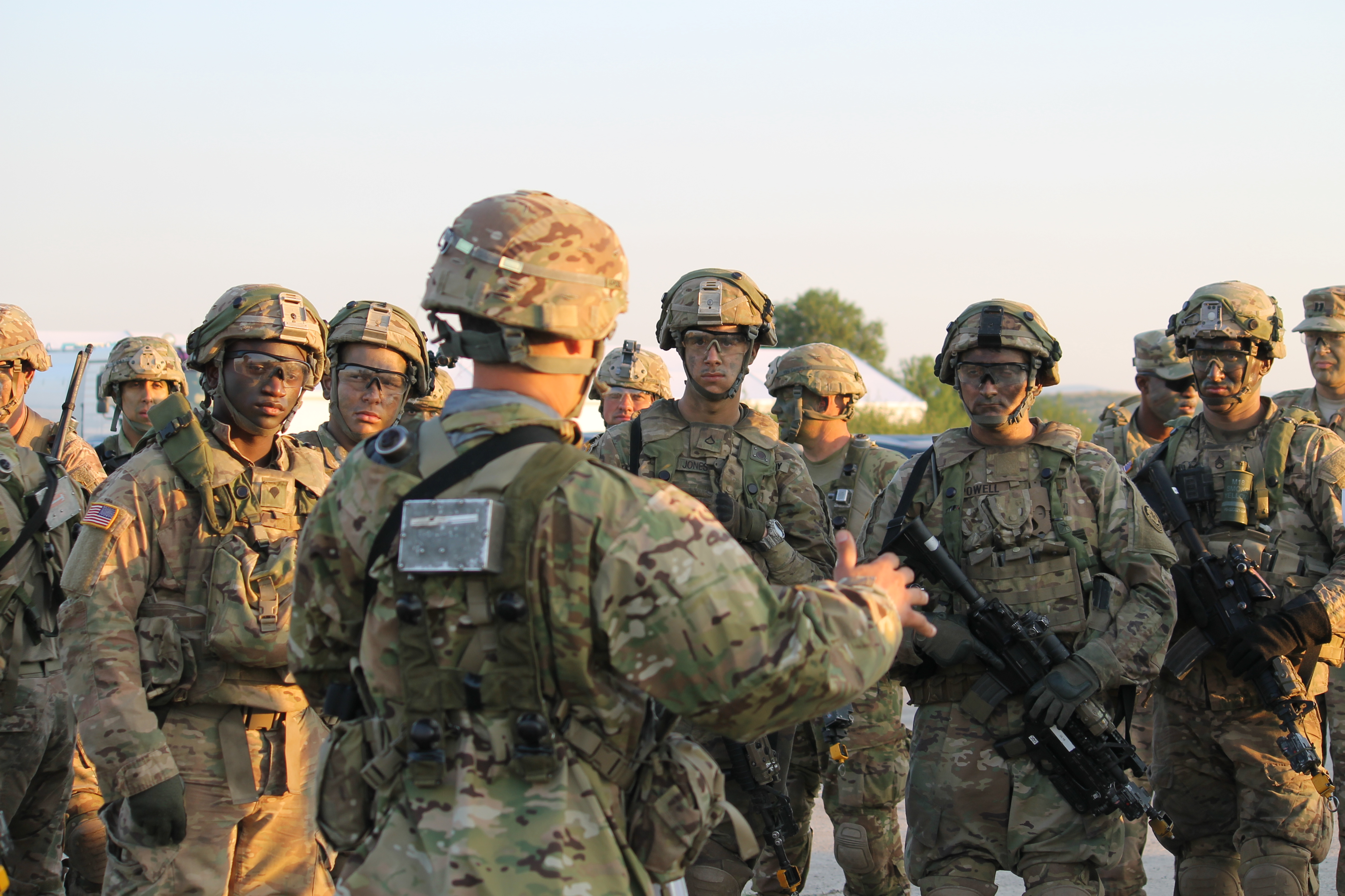 Troops in the U.S. Stryker unit discuss the mission ahead once on the ground. (Jen Judson/Staff)