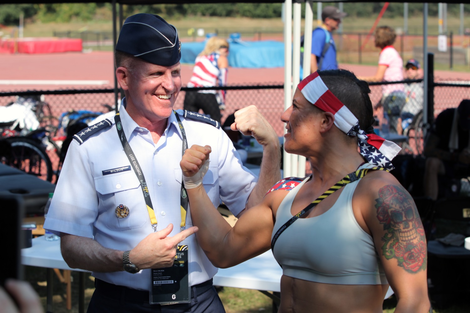 Vice Chief of Staff of the Air Force Gen. Stephen W. Wilson talks with Staff. Sgt. Sebastiana Lopez-Arellano at York Lions Stadium in Toronto, Canada, on Sept. 24, 2017. The Invictus Games, Sept. 23-30, is an international, Paralympic-style, multi-sport event, created by Prince Harry of Wales, in which wounded, injured or sick armed services personnel and their associated veterans take part in sports including wheelchair basketball, wheelchair rugby, sitting volleyball, archery, cycling, wheelchair tennis, powerlifting, golf, swimming and indoor rowing. (Staff Sgt. Daniel Luksan/Army)