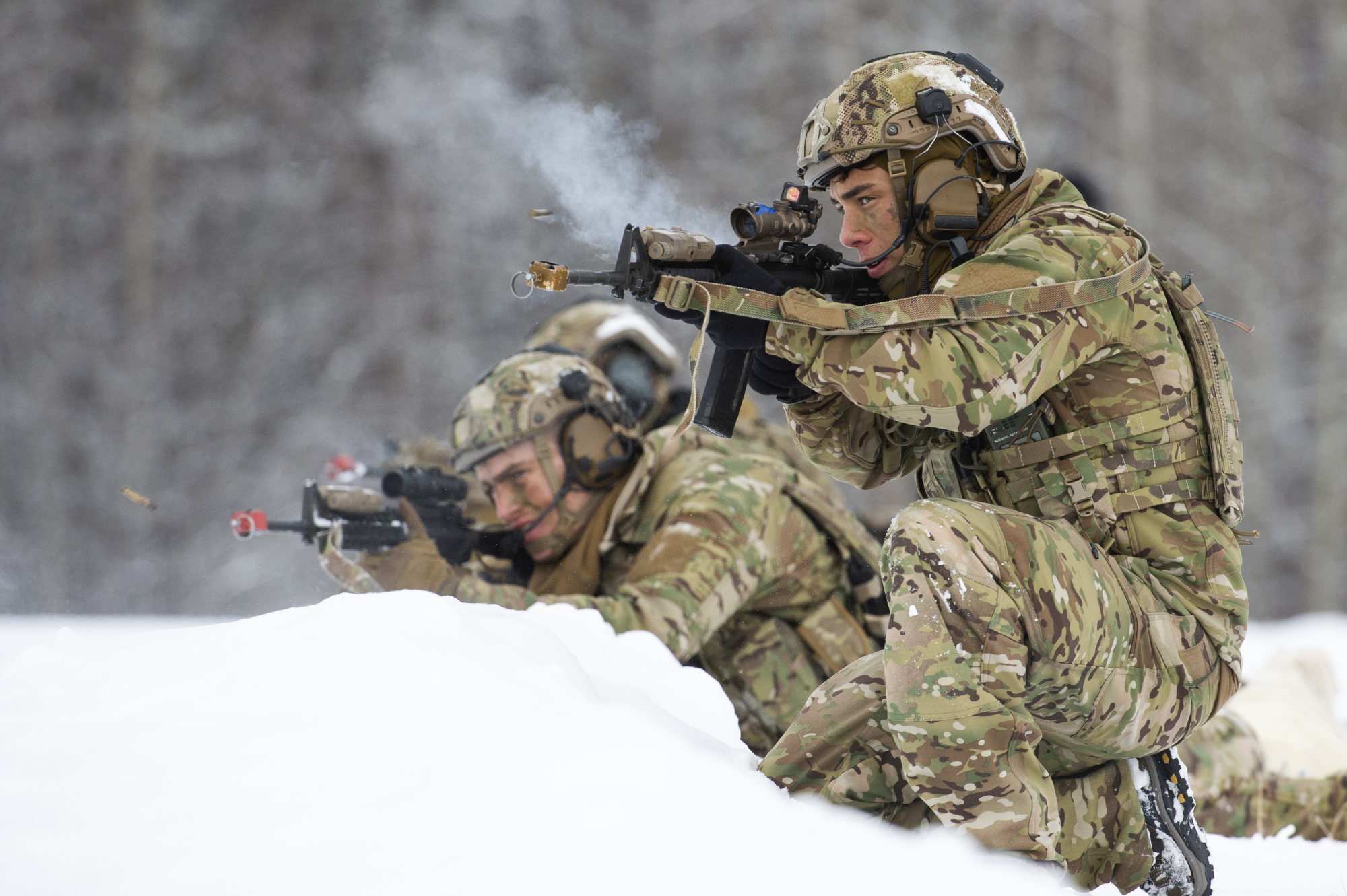 Airman 1st Class Nathan Ortiz, right, and fellow tactical air control party apprentices engage simulated opposing forces while conducting small-unit training at Joint Base Elmendorf-Richardson, Alaska, Feb. 12, 2020. (Alejandro Peña/Air Force)