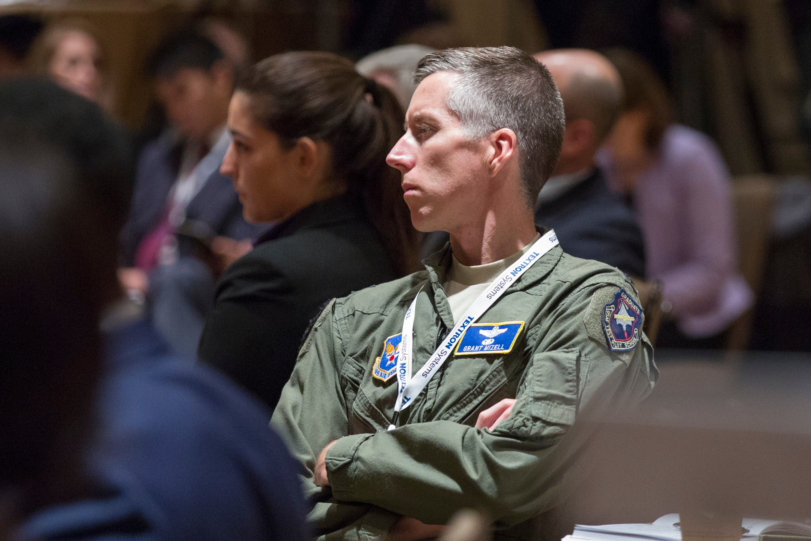 An attendee of the Defense News Conference listens to a panel on unmanned platforms on Sept. 6, 2017. (Amber Corrin/Staff)