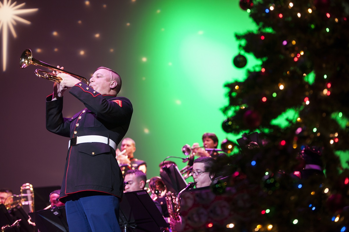 Lance Cpl. Christopher Lyman, a musician with Marine Corps Band New Orleans, plays the trumpet during the “Santa Meets Sousa” holiday concert at the Saenger Theatre, New Orleans, Dec. 9, 2017. The performance was one of several holiday concerts the band arranged throughout December to promote the Marine Corps Reserve Toys for Tots program, which donates toys to less fortunate children in the community. (Lance Cpl. Tessa D. Watts/Marine Corps)