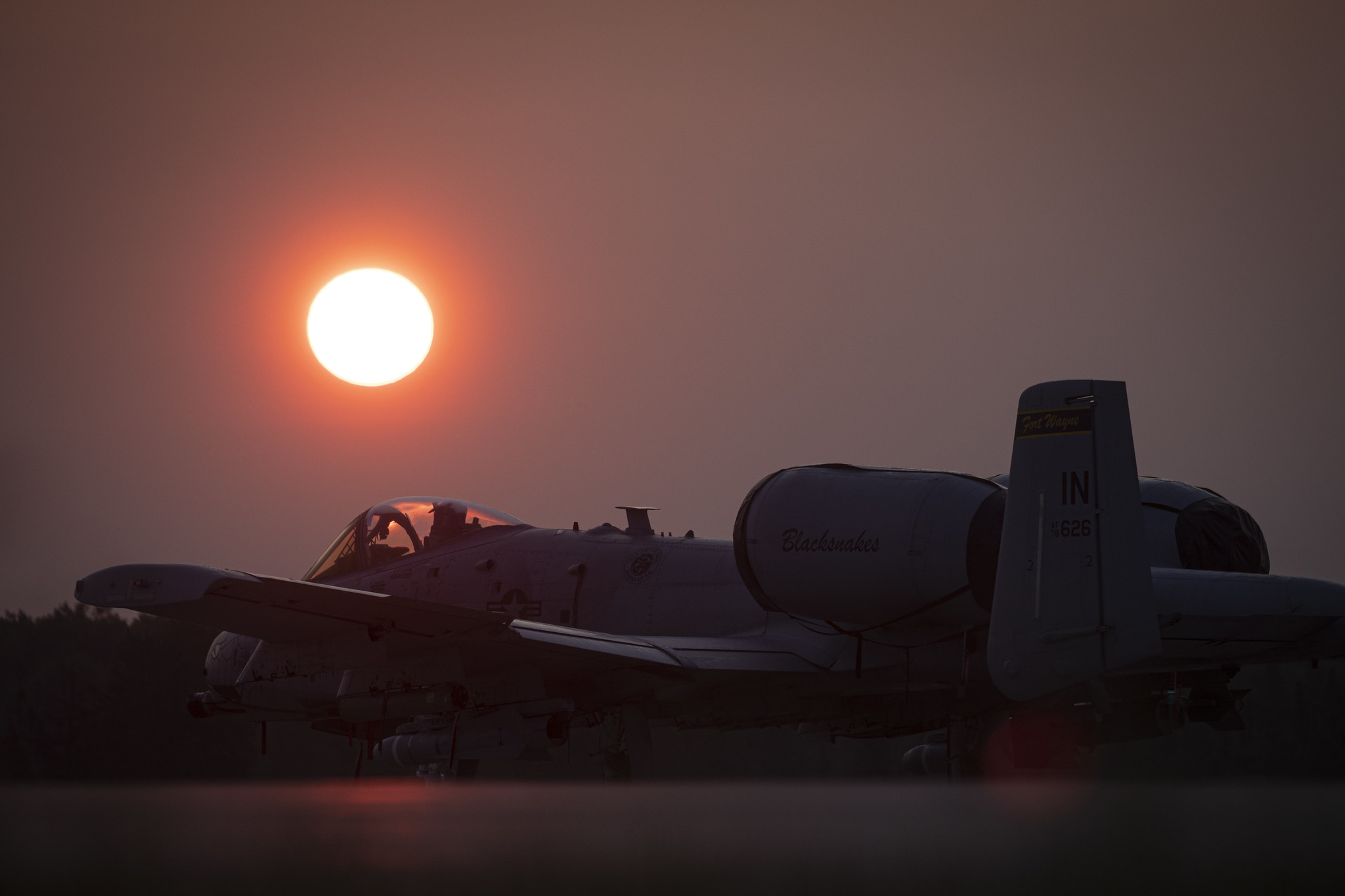 An Air Force A-10C Thunderbolt II sits on the flightline at sunrise during Northern Strike 19 at the Alpena Combat Readiness Training Center, Mich., July 26, 2019. (Master Sgt. Matt Hecht/Air National Guard)