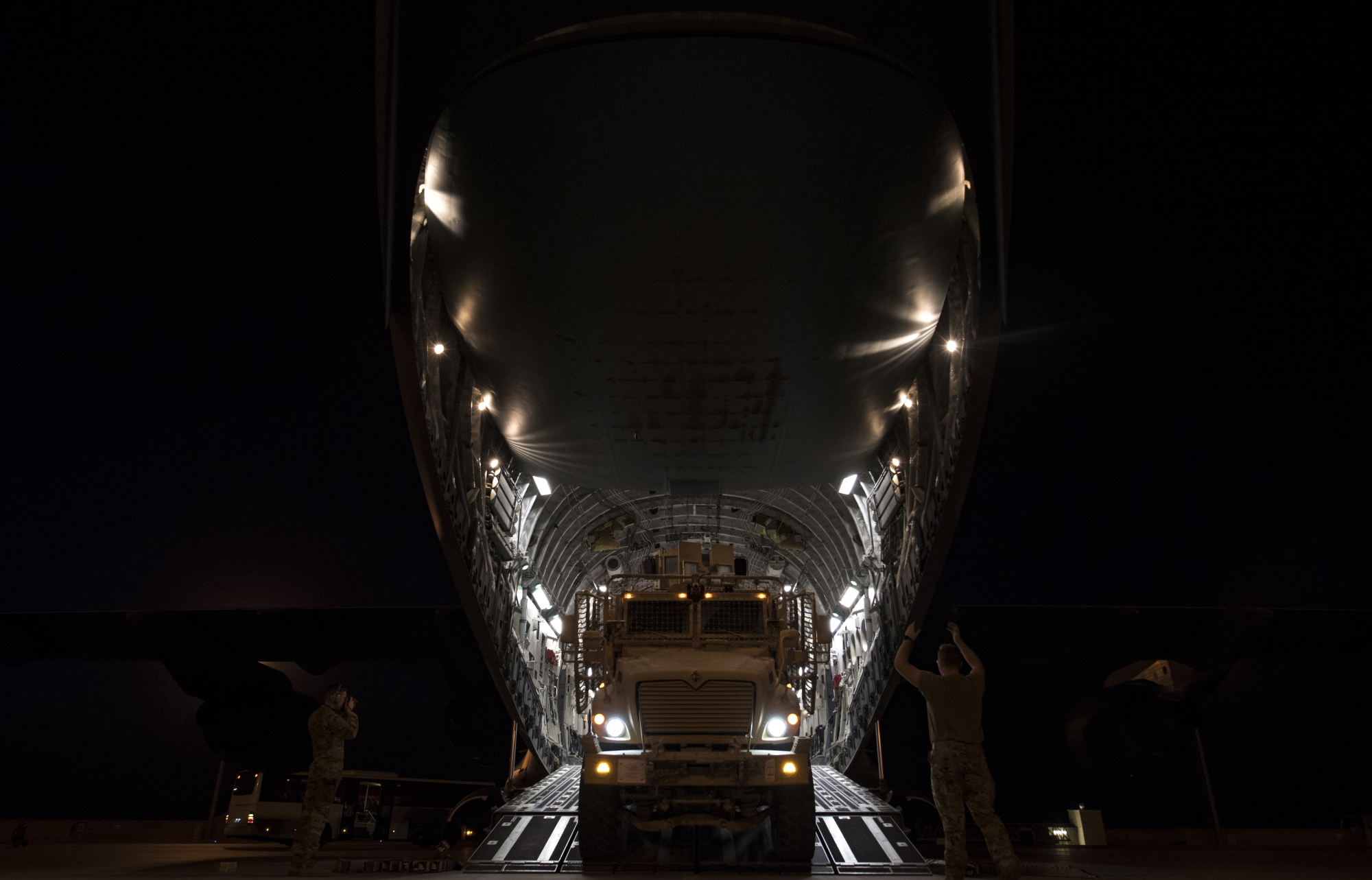 Airmen unload cargo off a C-17 Globemaster III at Bagram Airfield, Afghanistan, Oct. 20, 2019. (Staff Sgt. Matthew Lotz/Air Force)