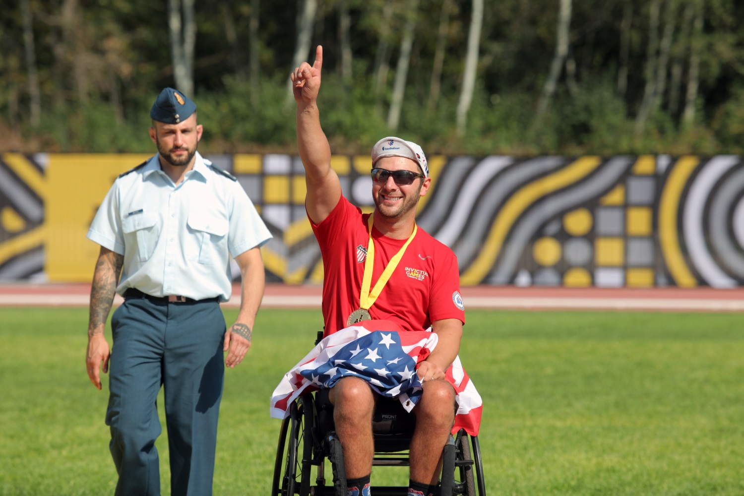 U.S. Navy veteran Nathan Dewalt places gold at the Invictus Games' track event, at York Lions Stadium in Toronto, Canada, on Sept. 24, 2017. (Staff Sgt. Daniel Luksan/Army)