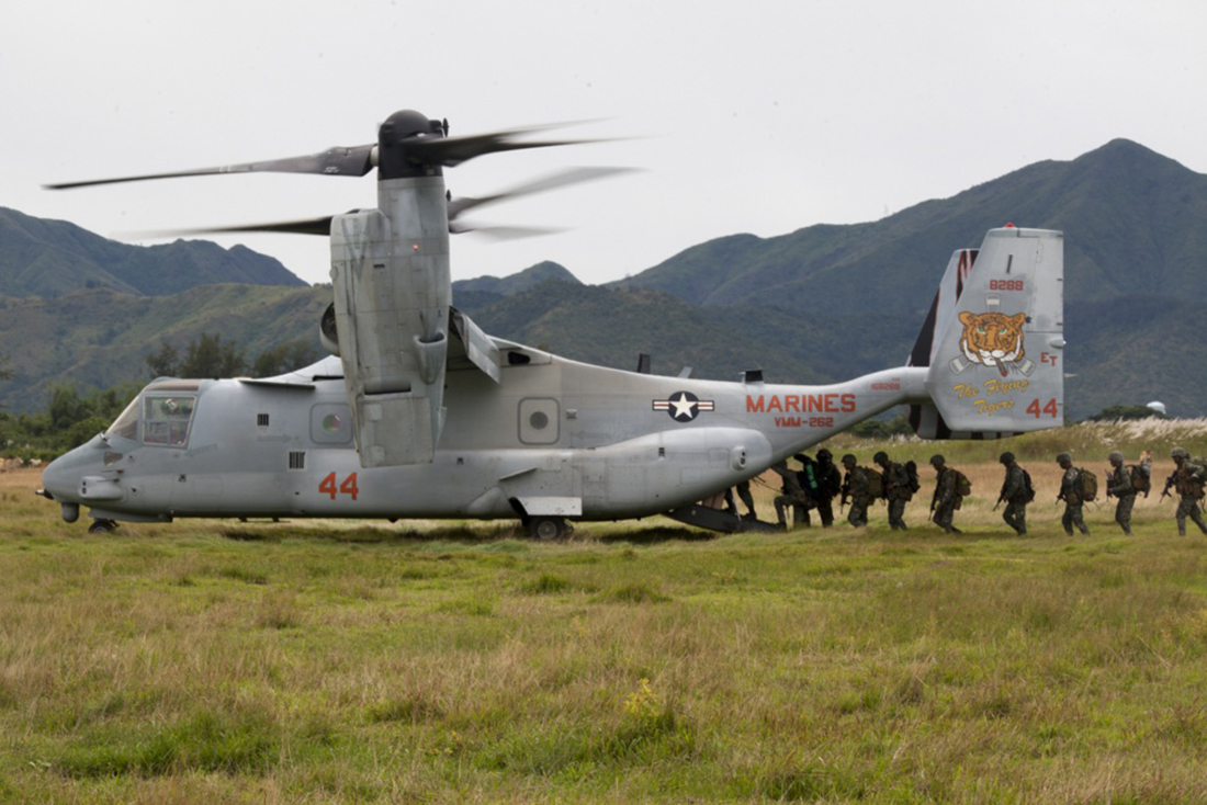 Philippine Marines load onto an MV-22B Osprey tiltrotor aircraft on Oct. 8, 2017, during exercise KAMANDAG at Colonel Ernesto P. Ravina Air Base, Philippines. (Cpl. Stormy Mendez/Marine Corps)