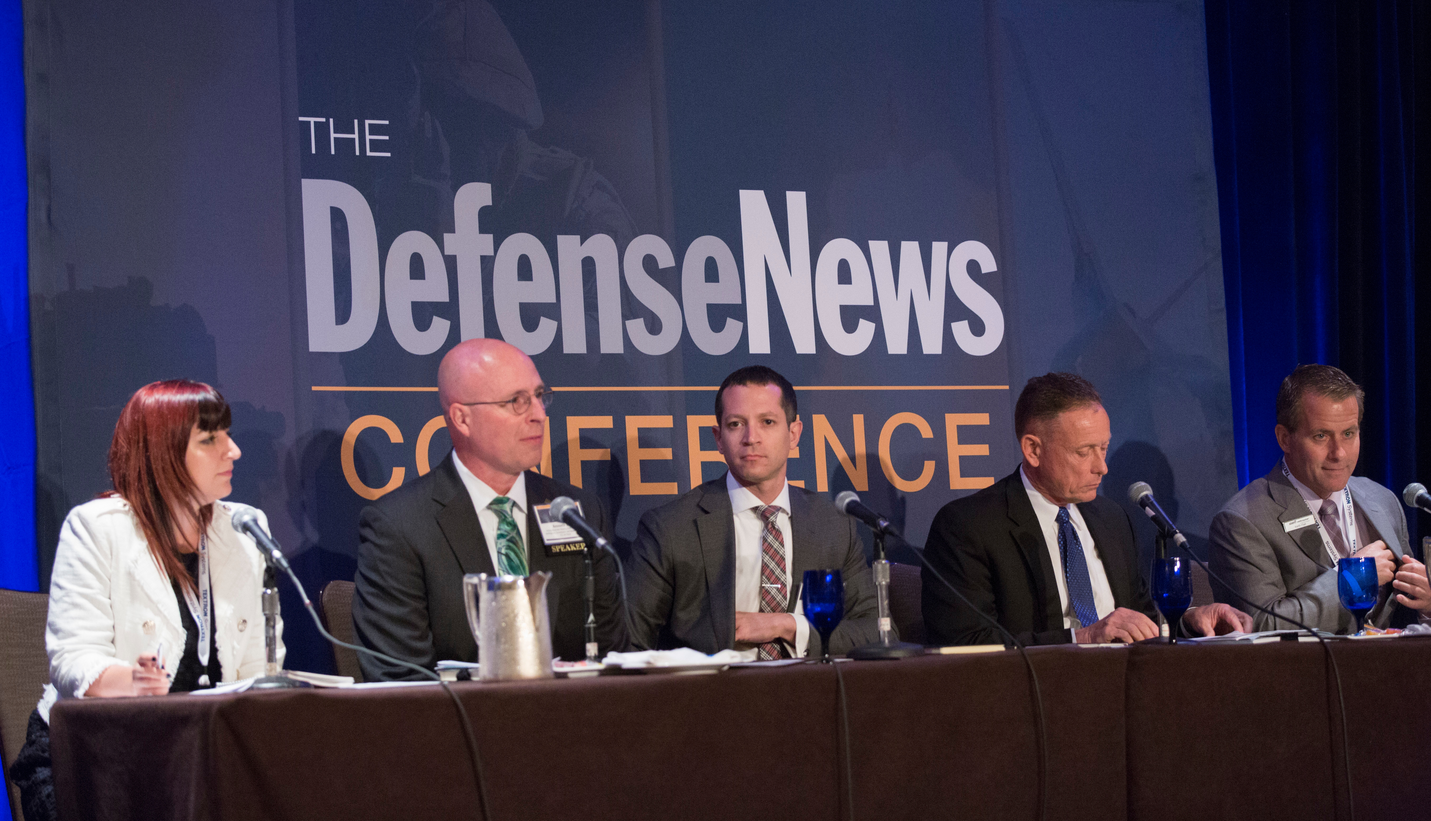 Defense News air warfare reporter Valerie Insinna, left, moderates a panel on unmanned platforms. (Amber Corrin/Staff)