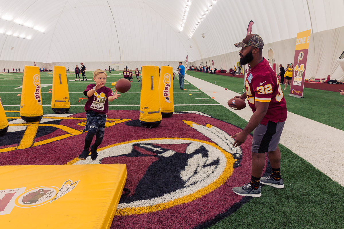 Military children participate in team-building activities for Army Forces Day on Saturday, June 19, 2018, at Redskins Park in Loudoun County, Va. (James Williams/Military Times)