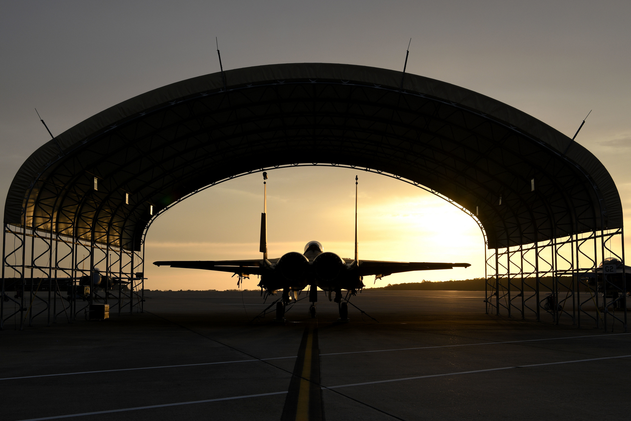 A U.S. Air Force F-15E Strike Eagle sits under a canopy on March 15, 2019, on the flightline at Seymour Johnson Air Force Base, N.C. (Senior Airman Victoria Boyton/Air Force)
