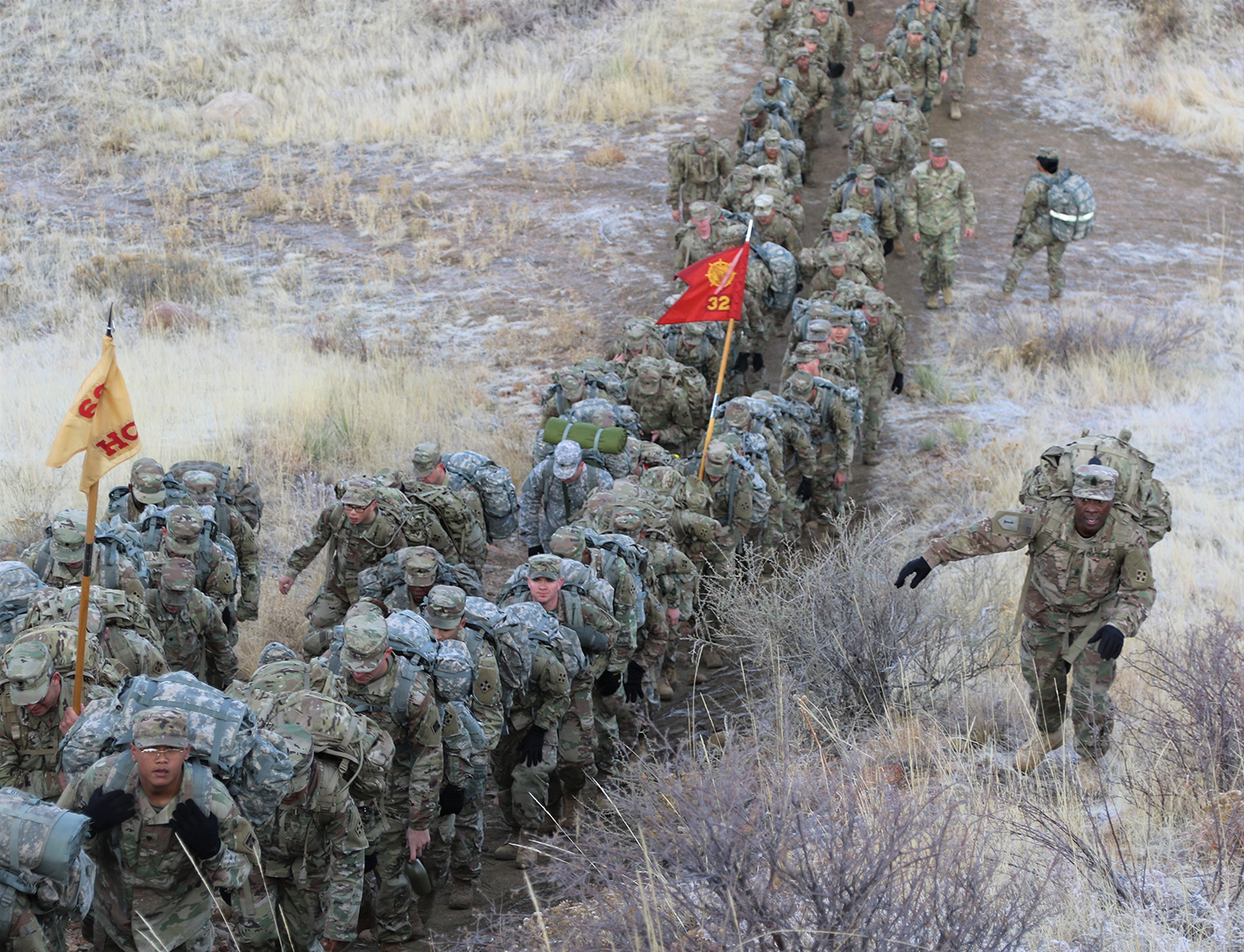 Soldiers with 68th Combat Sustainment Support Battalion, 4th Sustainment Brigade, move up a hill March 8 during a road march on Fort Carson, Colo. (Sgt. James Geelen/Army)