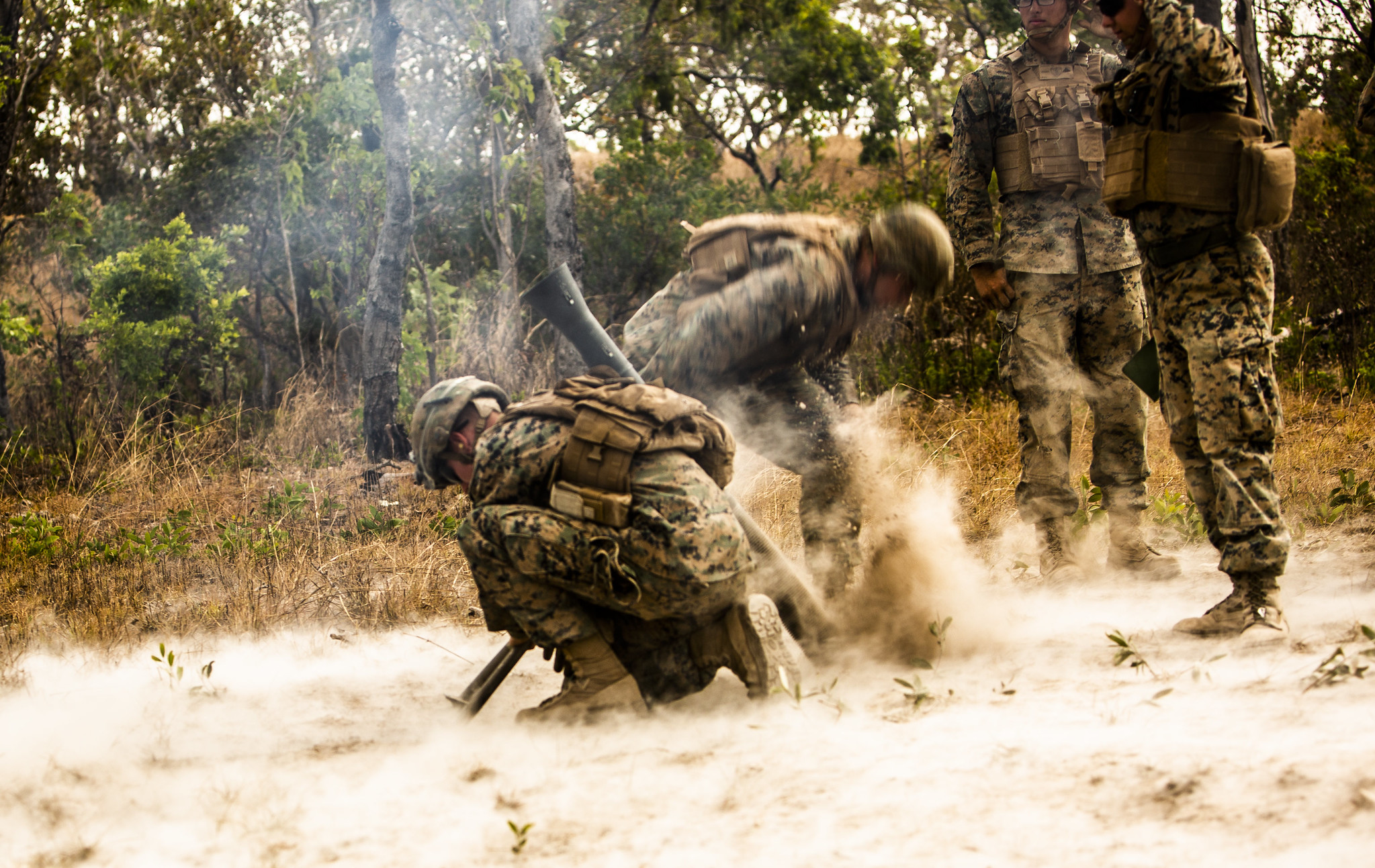 Marines with 3rd Battalion, 3rd Marine Regiment, a part of Marine Rotational Force - Darwin, fire an M252 81mm extended range mortar system during a fire support coordination exercise at Mount Bundey Training Area, Australia, Aug. 9, 2019. (Lance Cpl. Nicholas Filca/Marine Corps)