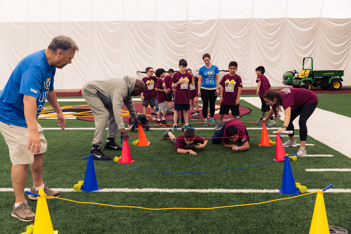 Military children participate in team-building activities for Army Forces Day on Saturday, June 19, 2018, at Redskins Park in Loudoun County, Va. (James Williams/Military Times)