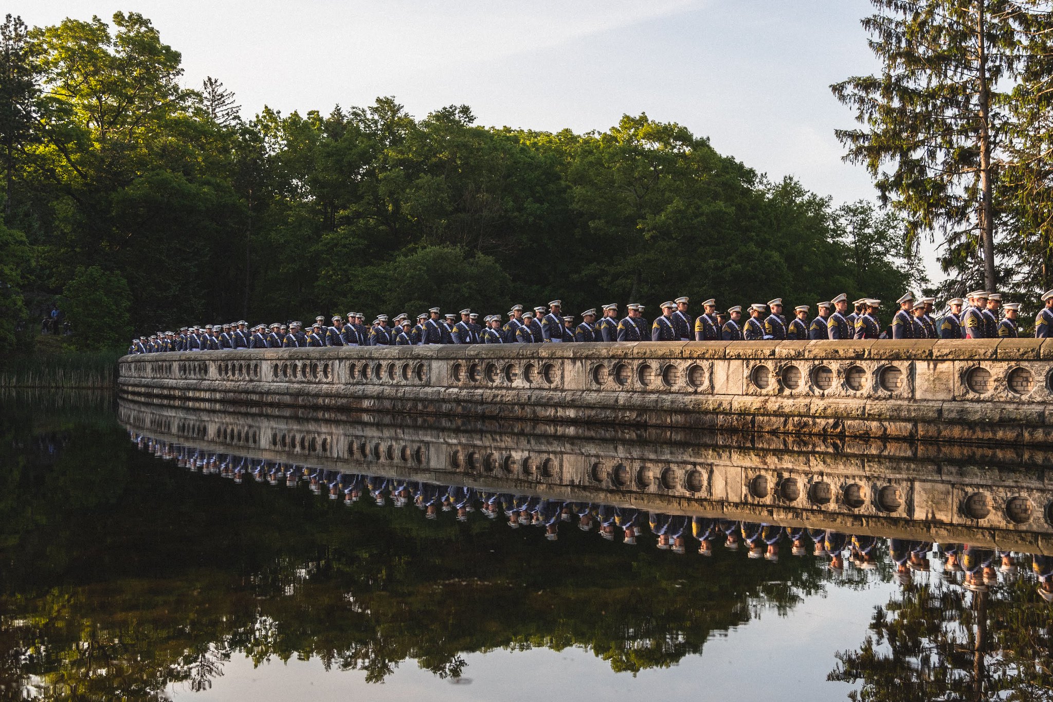 First class cadets walk across Luck Reservoir on their way to graduation May 25, 2019. (Cadet Alex Gudenkauf/Army)