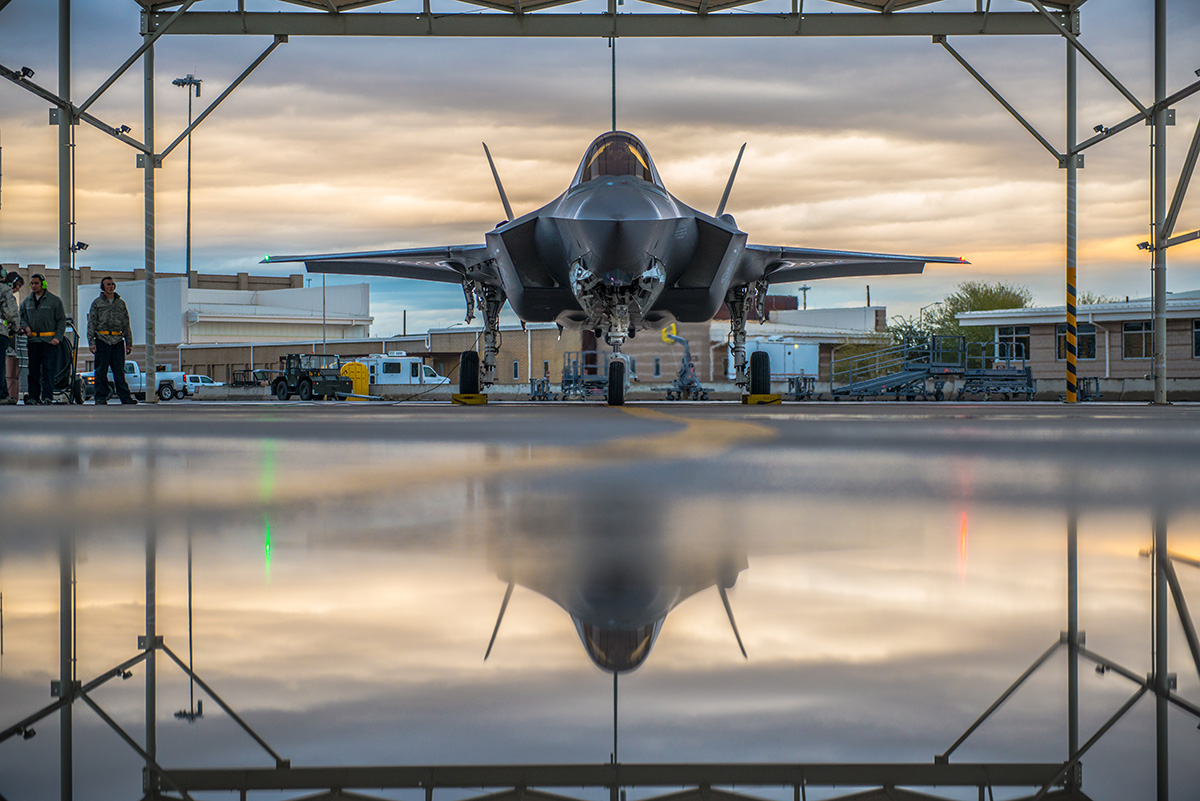 A pilot assigned to the 61st Fighter Squadron and 61st Aircraft Maintenance Unit crew chiefs prepare an F-35A Lightning II for taxi, Jan. 15, 2019 at Luke Air Force Base, Ariz. (Airman 1st Class Jacob Wongwai/Air Force)