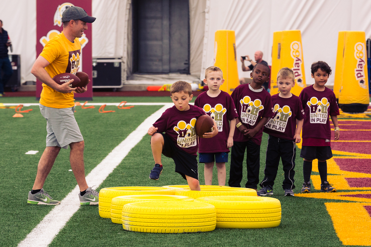 Military children participate in team-building activities for Army Forces Day on Saturday, June 19, 2018, at Redskins Park in Loudoun County, Va. (James Williams/Military Times)