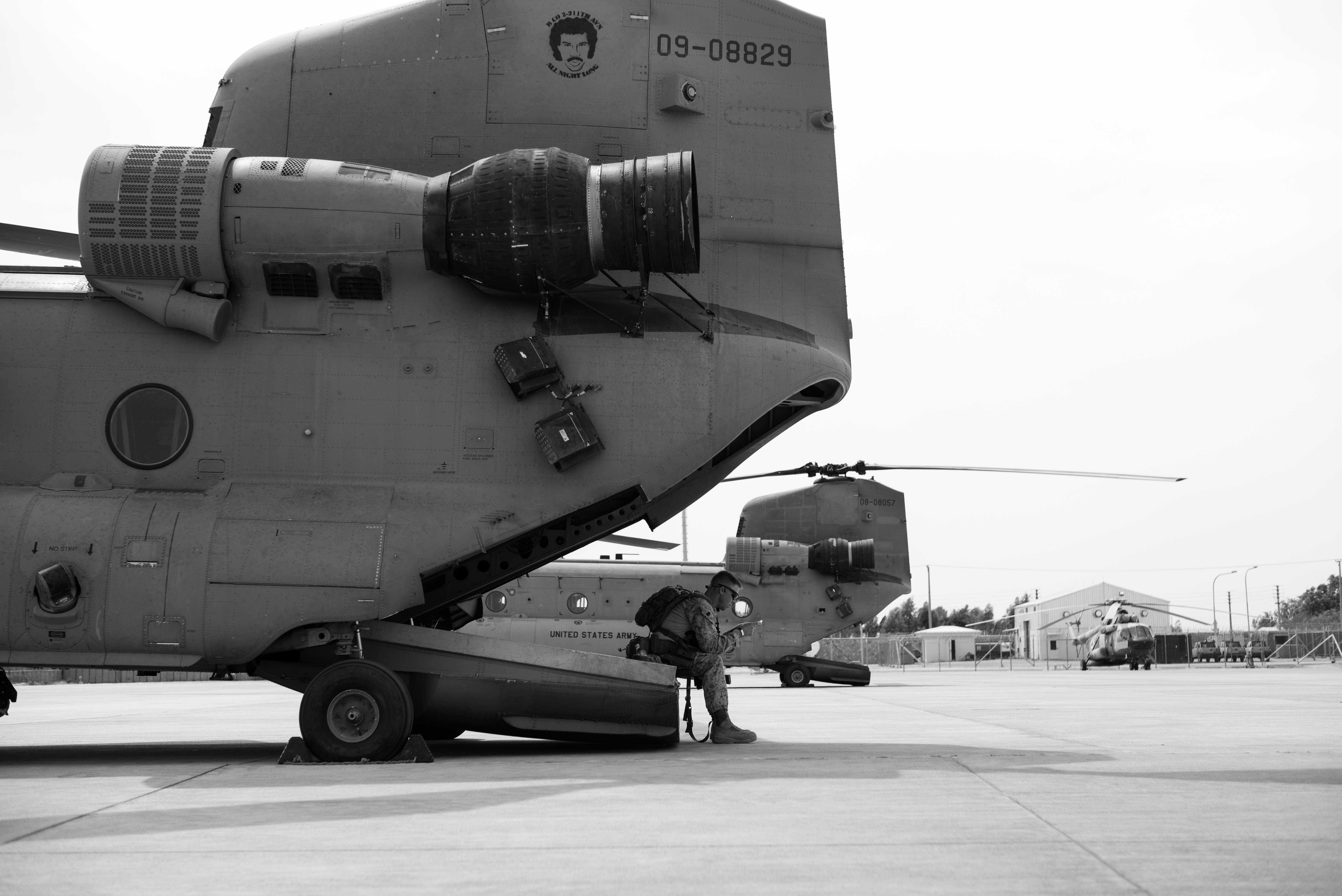 Afghanistan -- U.S. Marine reads a book on back of aircraft, seen in a production photo from National Geographic’s “Chain of Command.” The eight-part documentary series follows U.S. units around the world as they fight extremists from Africa to Afghanistan. Narrated by Chris Evans (“Captain America,” “The Avengers”), the series runs on Mondays at 9/8 central. (Cam Glendenning, special to Military Times/National Geographic)