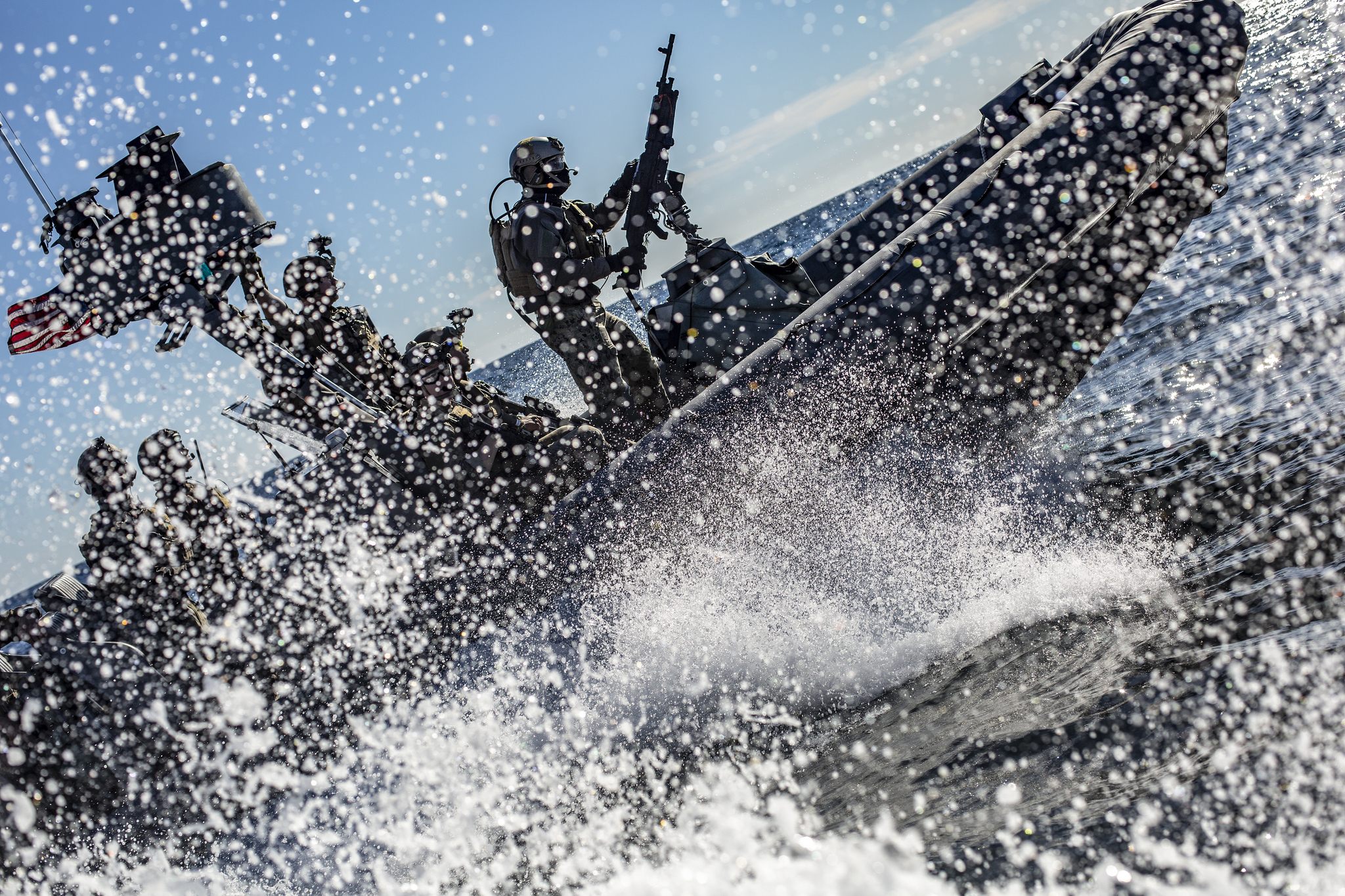 Marines and sailors with the 11th MEU ride in a rigid-hull inflatable boat during a visit, board, search and seizure exercise Feb. 24, 2019, in the Pacific. (Cpl. Matthew Teutsch//Marine Corps)