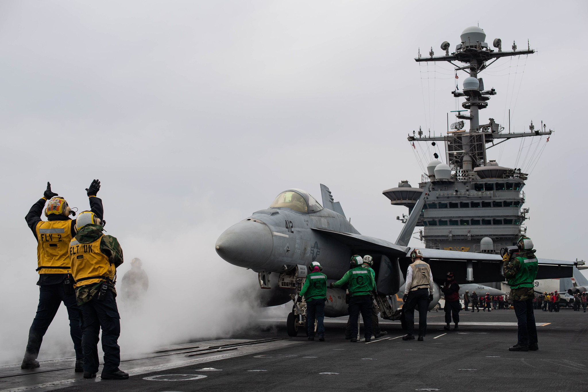 Sailors attach an F/A-18E Super Hornet to a steam-powered catapult on the flight deck of the aircraft carrier USS John C. Stennis (CVN 74) on April 22, 2019, in the Mediterranean Sea. (Mass Communication Specialist 3rd Class Grant G. Grady/Navy)