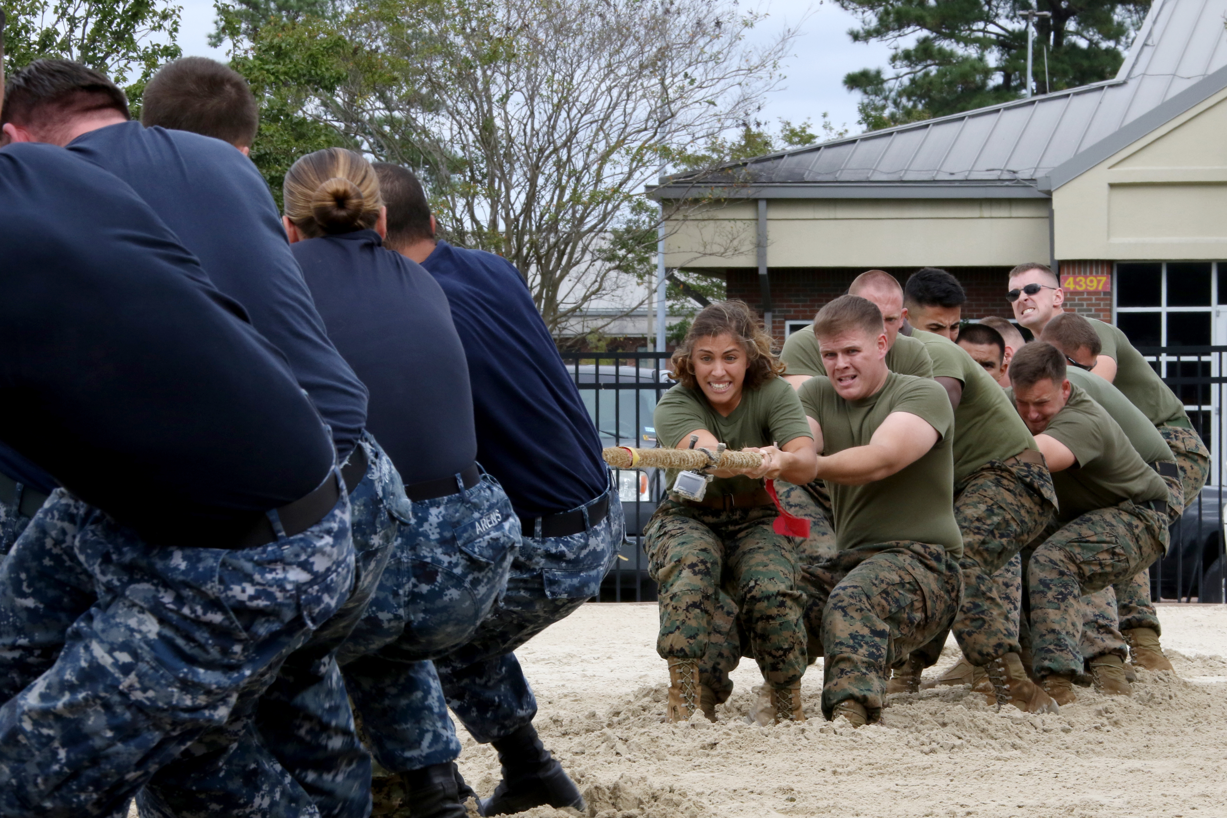 Sailors from the Naval Health Clinic and Marines from Marine Aerial Refueler Transport Squadron 252 battle it out in one of the early contests during the 2017 Combined Federal Campaign Tug-of-War Tournament at Marine Corps Air Station Cherry Point, N.C., Oct. 13, 2017. (Cpl. Jason Jimenez/Marine Corps)