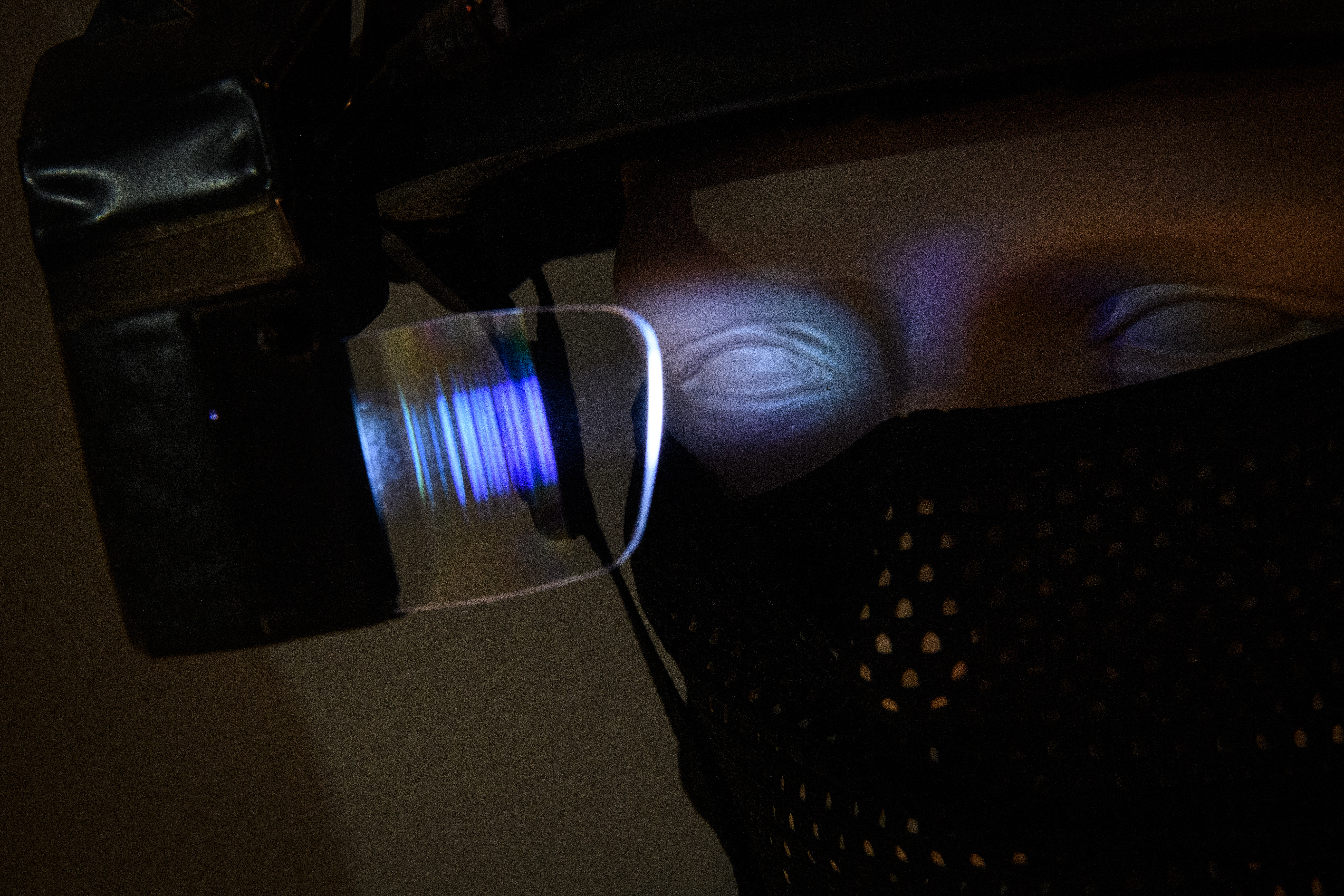 A model head wearing a SHADES heads-up display computing system is seen at the DSEI arms fair. (Leon Neal/Getty Images)