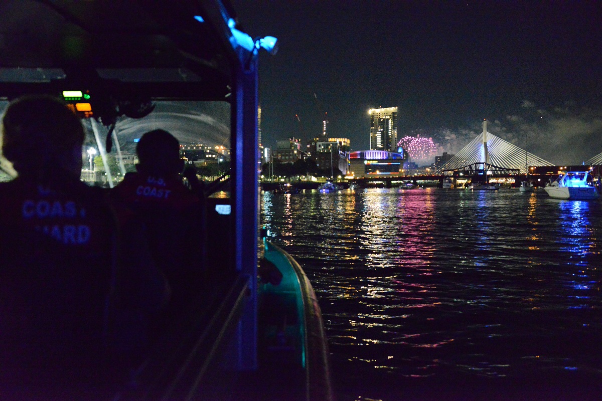 A boarding team from Coast Guard Station Boston patrols Boston Harbor during Independence Day celebrations, July 4, 2018. (U.S. Coast Guard/Petty Officer 2nd Class Lara Davis)
