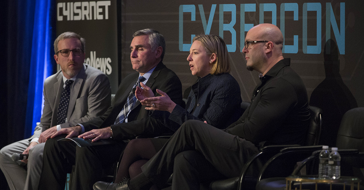 Mike Gruss, left, editor of C4ISRNET moderates a panel discussion on the New Critical Infrastructure with Maj. Gen. John Davis, USA (ret.), Vice President and Federal Chief Security Officer, Palo Alto Networks and former Deputy Assistant Secretary of Defense for Cyber Policy (Acting), Jeanette Manfra Assistant Secretary, Office of Cybersecurity and Communications, and James Scott, Senior Fellow, ICIT, during Cybercon 2017 at the Ritz-Carlton Hotel in Pentagon City on Nov. 28, 2017. ( Ben Murray/Staff)