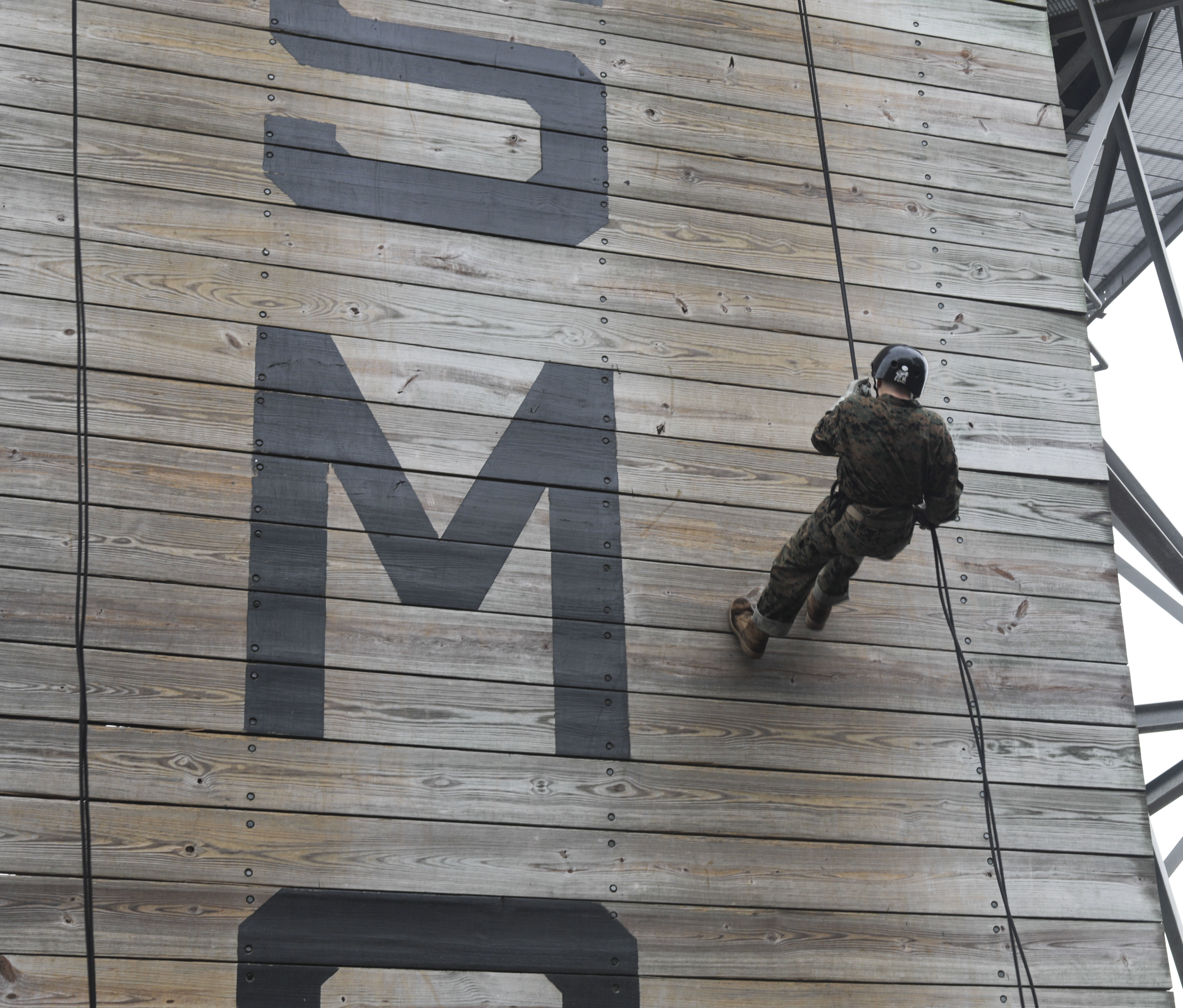 Recruits with Bravo Company, 1st Recruit Training Battalion, go down the rappel tower at Marine Corps Recruit Depot Parris Island, S.C., Dec. 30, 2019. (Lance Cpl. Godfrey Ampong/Marine Corps)