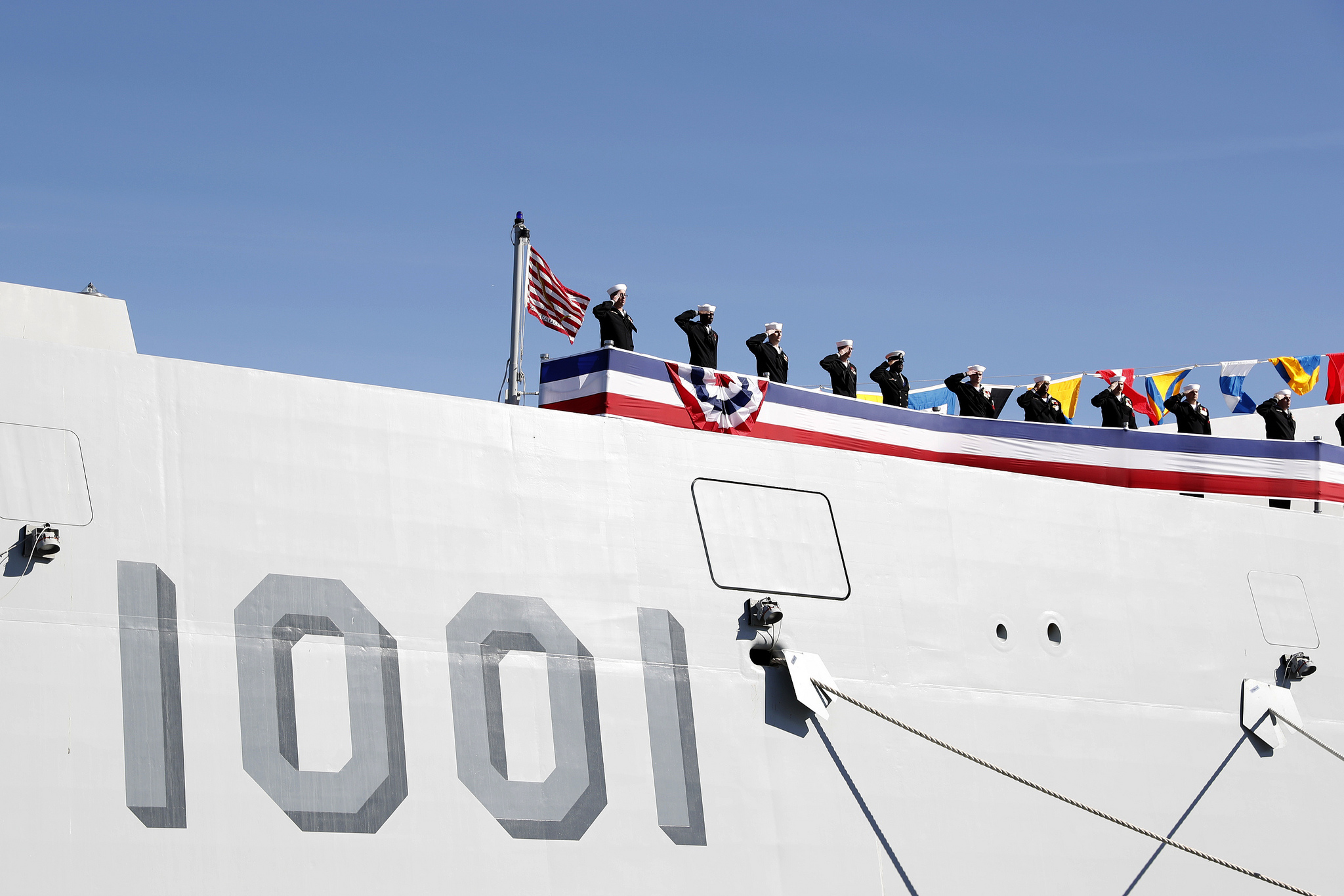 The crew of the Zumwalt-class guided-missile destroyer USS Michael Monsoor (DDG 1001) brings the ship to life during its commissioning ceremony on Jan. 26, 2019, in San Diego. Michael Monsoor is the second Zumwalt-class destroyer to enter the fleet. It is the first Navy combat ship named for fallen Master-at-Arms 2nd Class (SEAL) Michael Monsoor, who was posthumously awarded the Medal of Honor for his heroic actions while serving in Ramadi, Iraq, in 2006. (Mass Communication Specialist 1st Class Peter Burghart/Navy)
