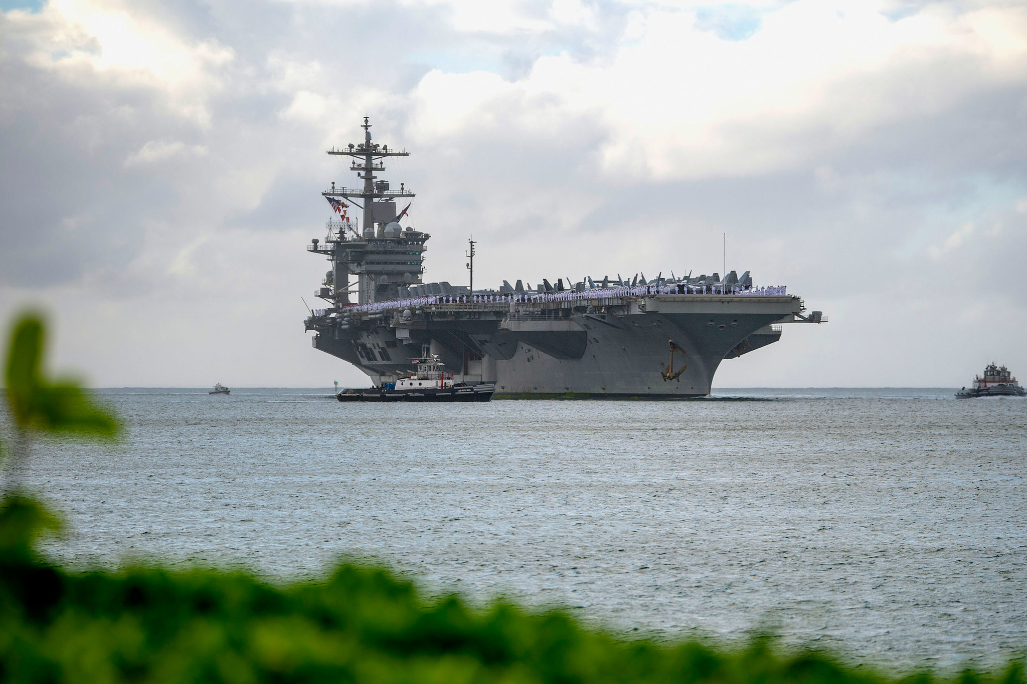 The aircraft carrier USS Abraham Lincoln (CVN 72) arrives at Joint Base Pearl Harbor-Hickam on Jan. 8, 2020, as part of an around-the-world deployment that includes a homeport shift to San Diego. (Mass Communication Specialist 3rd Class Aja B. Jackson/Navy)