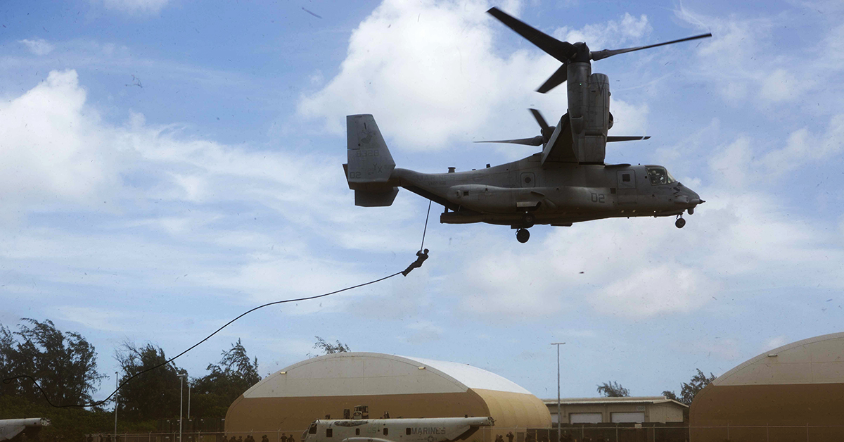 Marines with Lima Company, Battalion Landing Team 3/1, 13th Marine Expeditionary Unit (MEU), fast-rope out of an MV-22B Osprey, Marine Medium Tiltrotor Squadron 166 Reinforced, 13th MEU, during sustainment training exercise, July 21, 2018 in Hawaii. (Cpl. A. J. Van Fredenberg/Marine Corps)