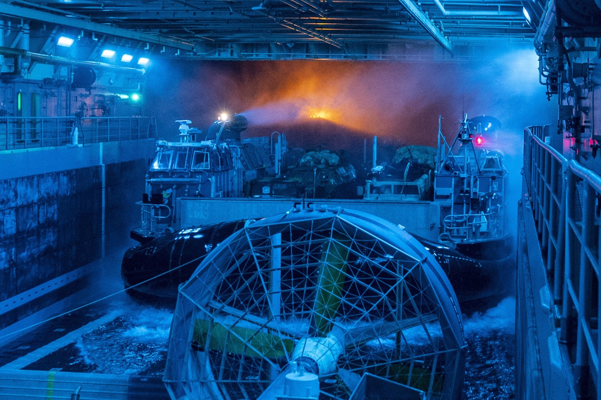 A landing craft, air cushion enters the well deck of the San Antonio-class amphibious transport dock ship USS John P. Murtha (LPD 26) on May 28, 2019, in the Pacific Ocean. (Mass Communication Specialist 2nd Class Kyle Carlstrom/Navy)