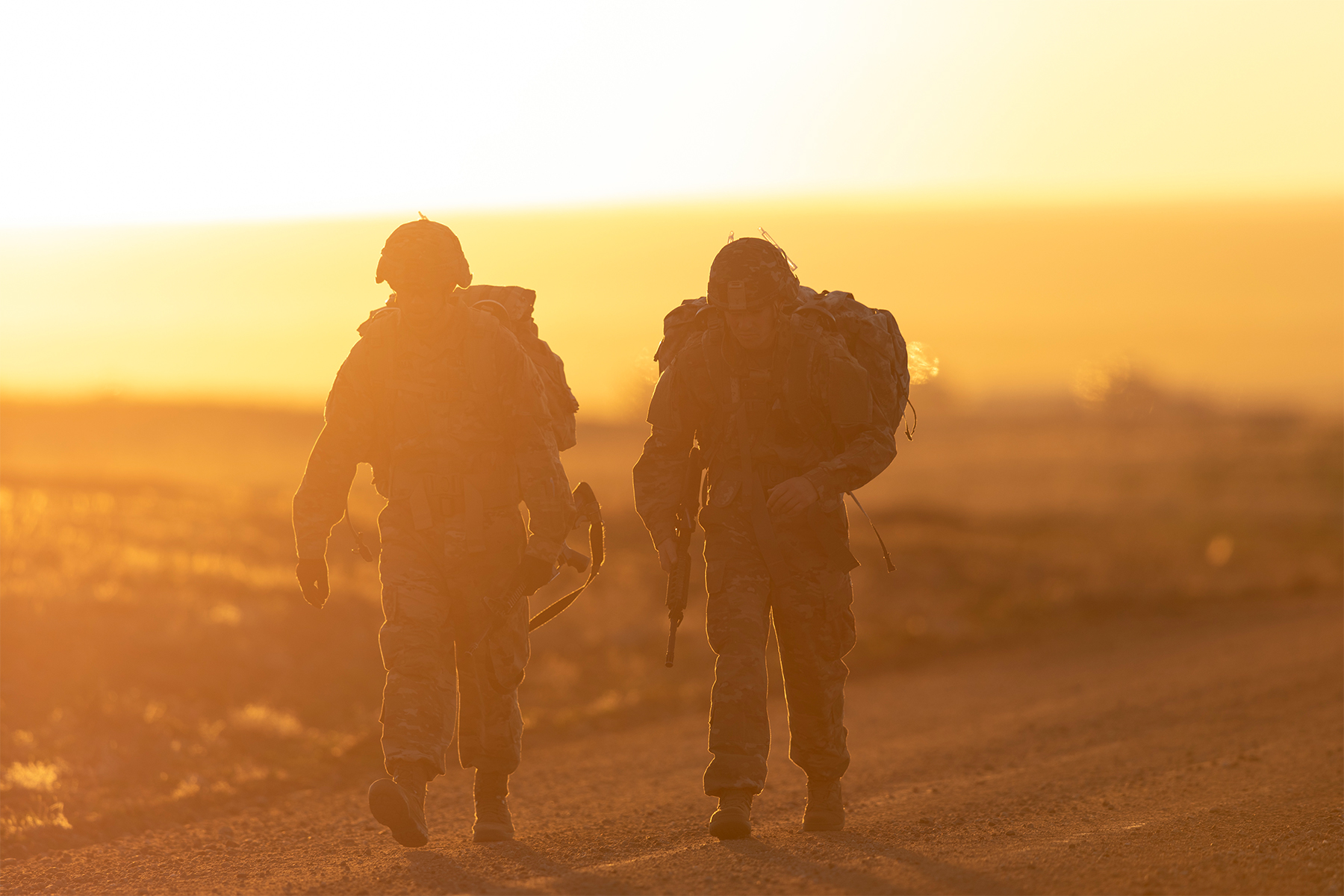 Army Spcs. Eduardo Siordia and Keith Zimmerman approach the midpoint of a 12-mile ruck march during the Best Warrior competition at Fort Carson, Colo., April 26, 2019. (Sgt. Micah Merrill/Army)