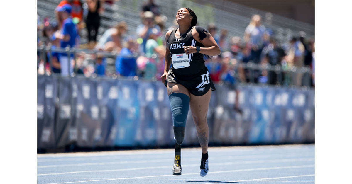 Team Army Spc. Stephanie Johnson finishes a race despite a race injury during the 2018 Warrior Games at the Air Force Academy in Colorado Springs, Colo. June 2, 2018. (EJ Hersom/DoD)