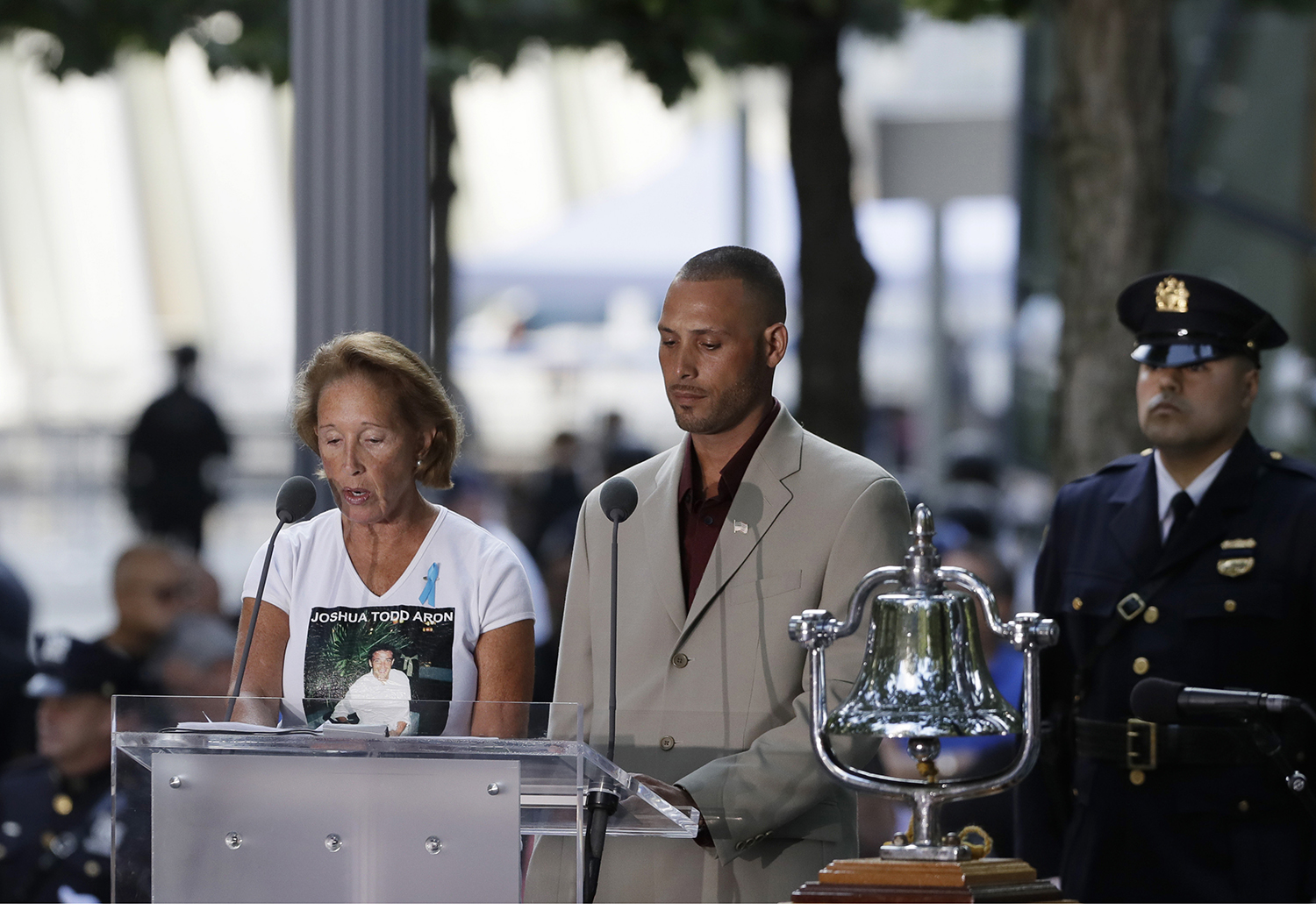 The names are read of victims of the Sept. 11 attacks during a ceremony marking the 18th anniversary at the National September 11 Memorial, Wednesday, Sept. 11, 2019 in New York. (Mark Lennihan/AP)