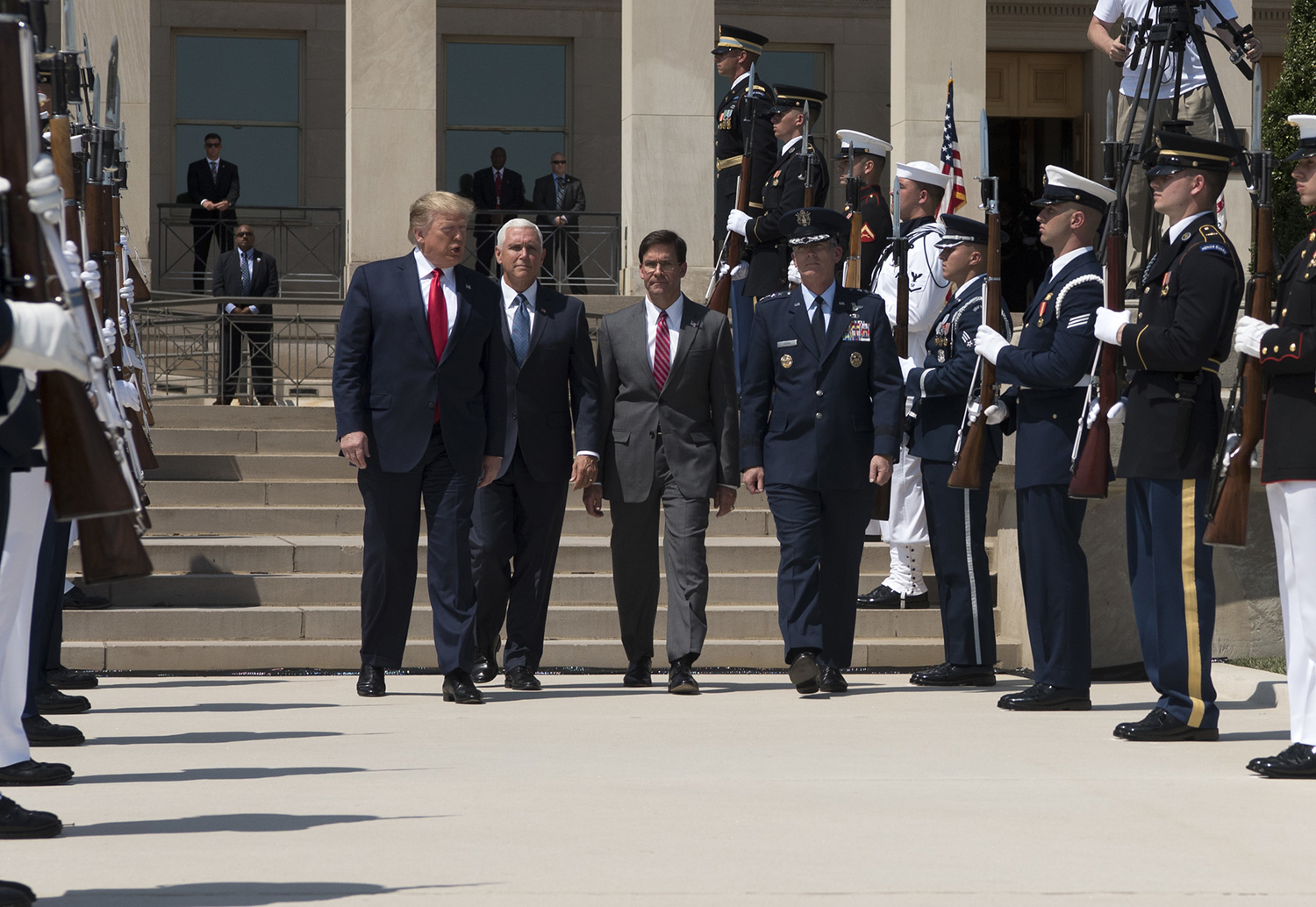 President Donald Trump, Vice President Michael Pence, Secretary of Defense Dr. Mark T. Esper and Air Force Gen. Paul J. Selva, vice chairman of the Joint Chiefs of Staff, participate in a full honors welcome ceremony for Secretary Esper at the Pentagon on July 25, 2019. (Army Sgt. Amber I. Smith/DoD)