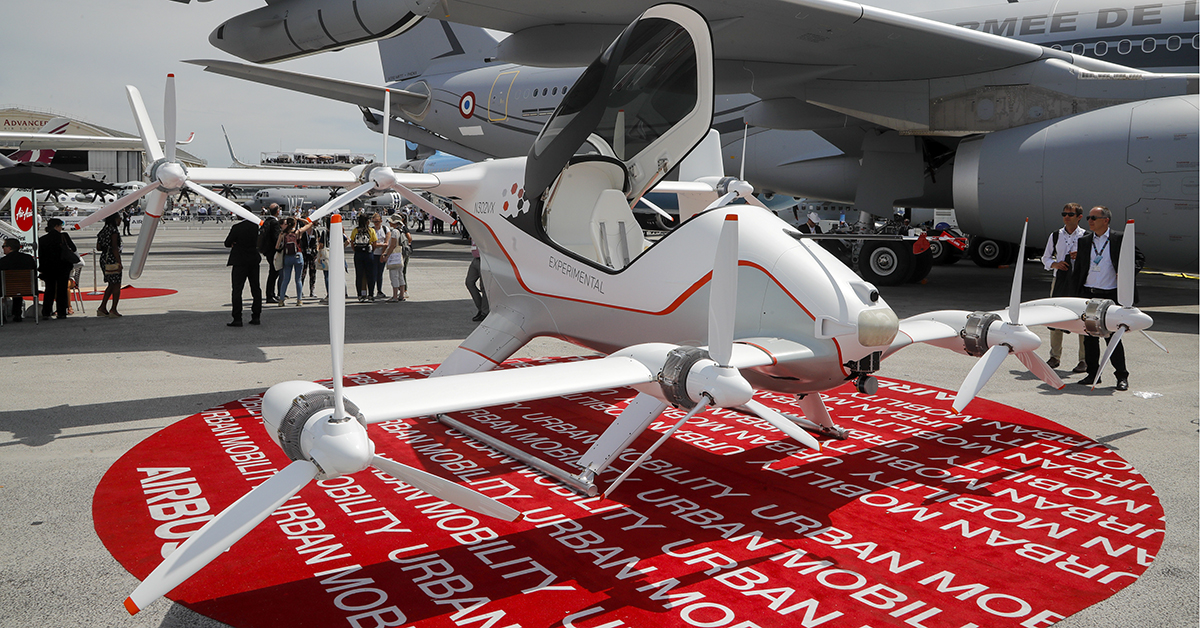 A prototype of an electric unmanned air taxi is displayed at the Paris Air Show on June 18, 2019. Airbus has developed a prototype, the Vahana, an autonomous, self-piloted aircraft. (Michel Euler/AP)