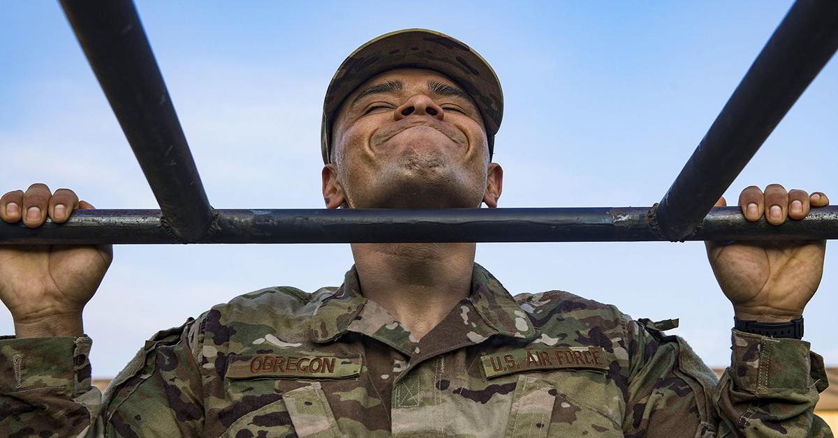 Tech. Sgt. Jose Obregon, 347th Operations Support Squadron independent duty medical technician, performs pull ups during a Pre-Ranger Assessment Course, Aug. 24, 2018, at Moody Air Force Base, Georgia. (Senior Airman Greg Nash/Air Force)