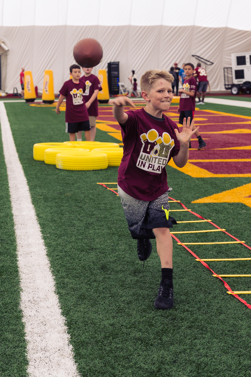Military children participate in team-building activities for Army Forces Day on Saturday, June 19, 2018, at Redskins Park in Loudoun County, Va. (James Williams/Military Times)