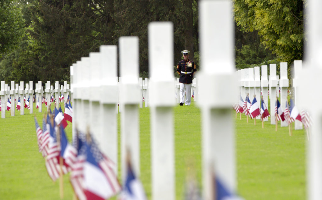 U.S. Marine Corps Sgt. Maj. Darrell Carver walks through the headstones prior to a Memorial Day commemoration at the Aisne-Marne American Cemetery in Belleau, France, Sunday, May 27, 2018. The cemetery contains more that 2,000 American dead. (Virginia Mayo/AP)