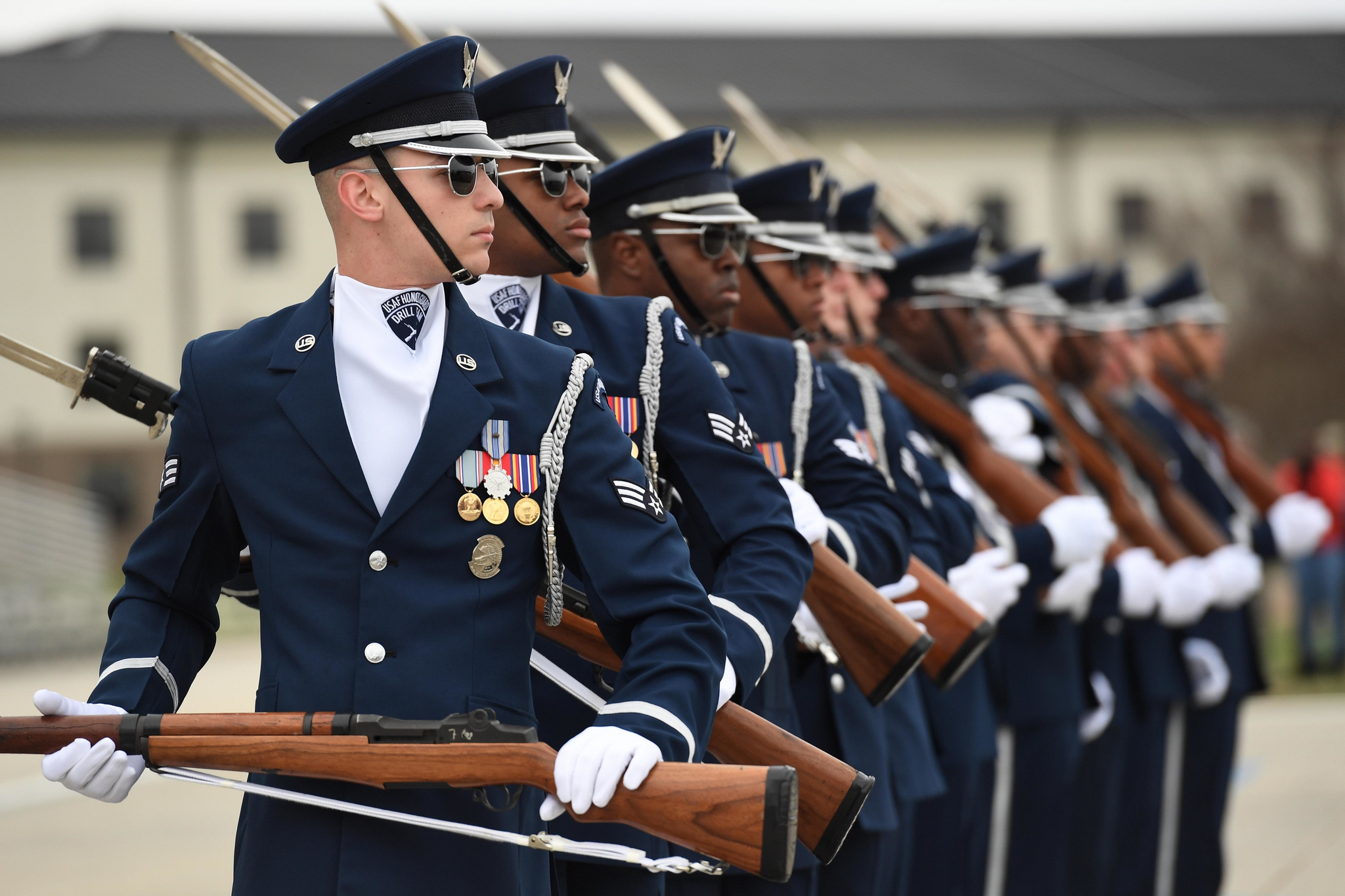 The U.S. Air Force Honor Guard Drill Team debuts their 2019 routine in front of Keesler leadership and 81st Training Group Airmen on the Levitow Training Support Facility drill pad at Keesler Air Force Base, Miss., Feb. 8, 2019. (Kemberly Groue/Air Force)