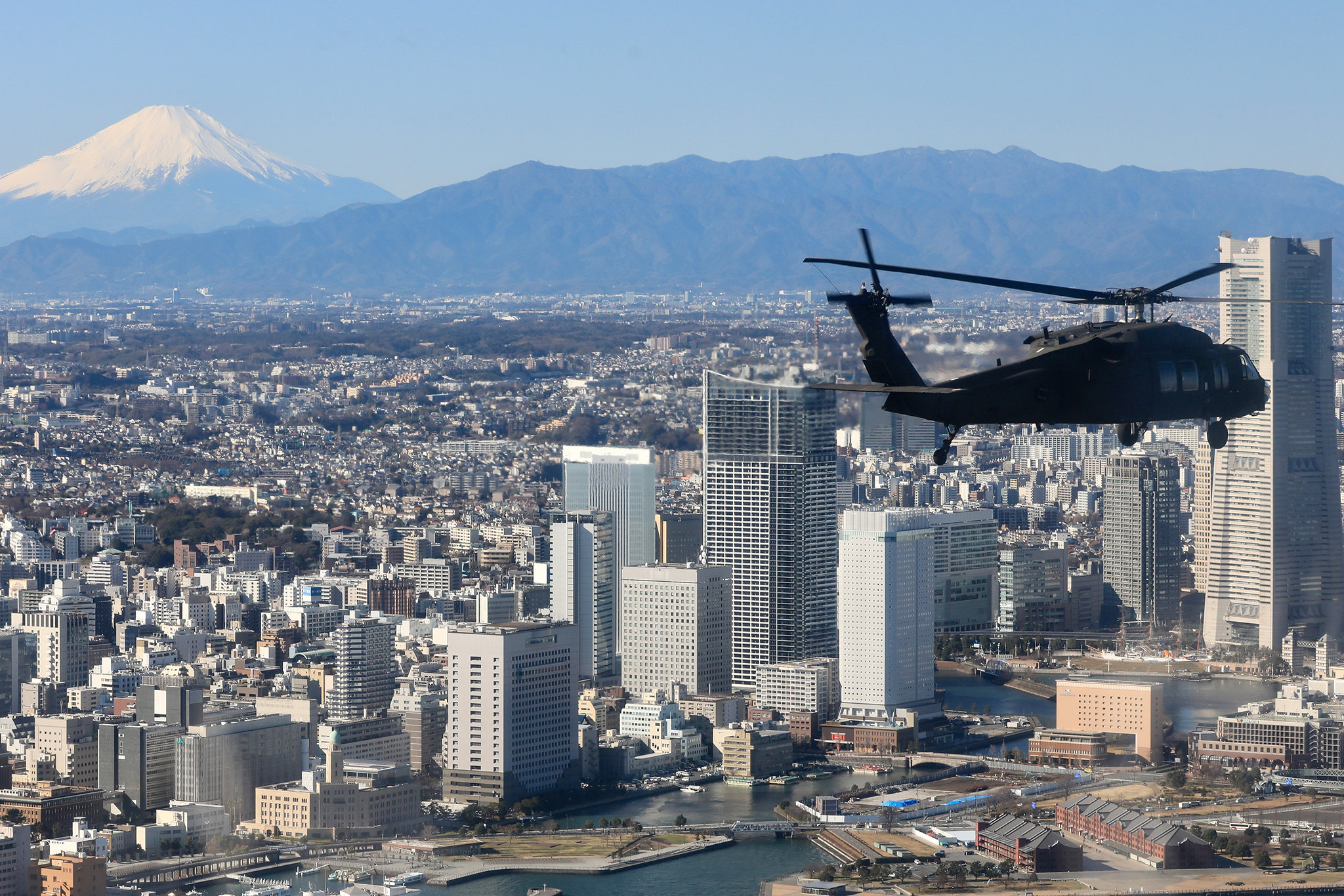 Soldiers with U.S. Army Aviation Battalion Japan soar the skies in a UH-60 Black Hawk Helicopter during a joint training exercise with Japan Ground Self-Defense Force members to rehearse tactical flight operations at Camp Zama, Japan, Jan. 9, 2020. (Sgt. Raquel Villalona/Army)