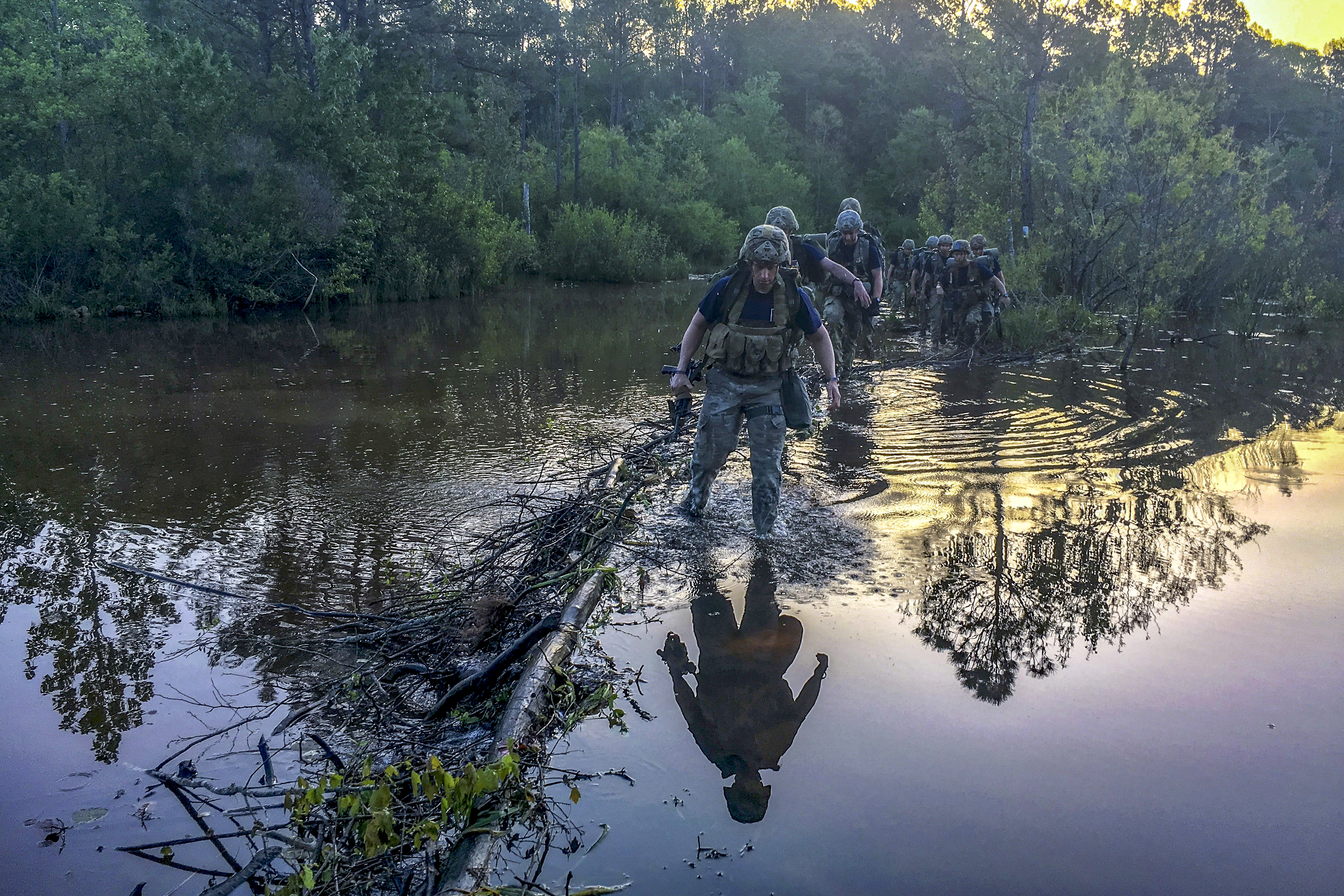 Paratroopers from 5th Squadron, 73rd Cavalry Regiment cross a river during the 3rd Brigade Combat Team, 82nd Airborne Division's May Best Squad Competition. (Maj. Thomas Cieslak/Army)